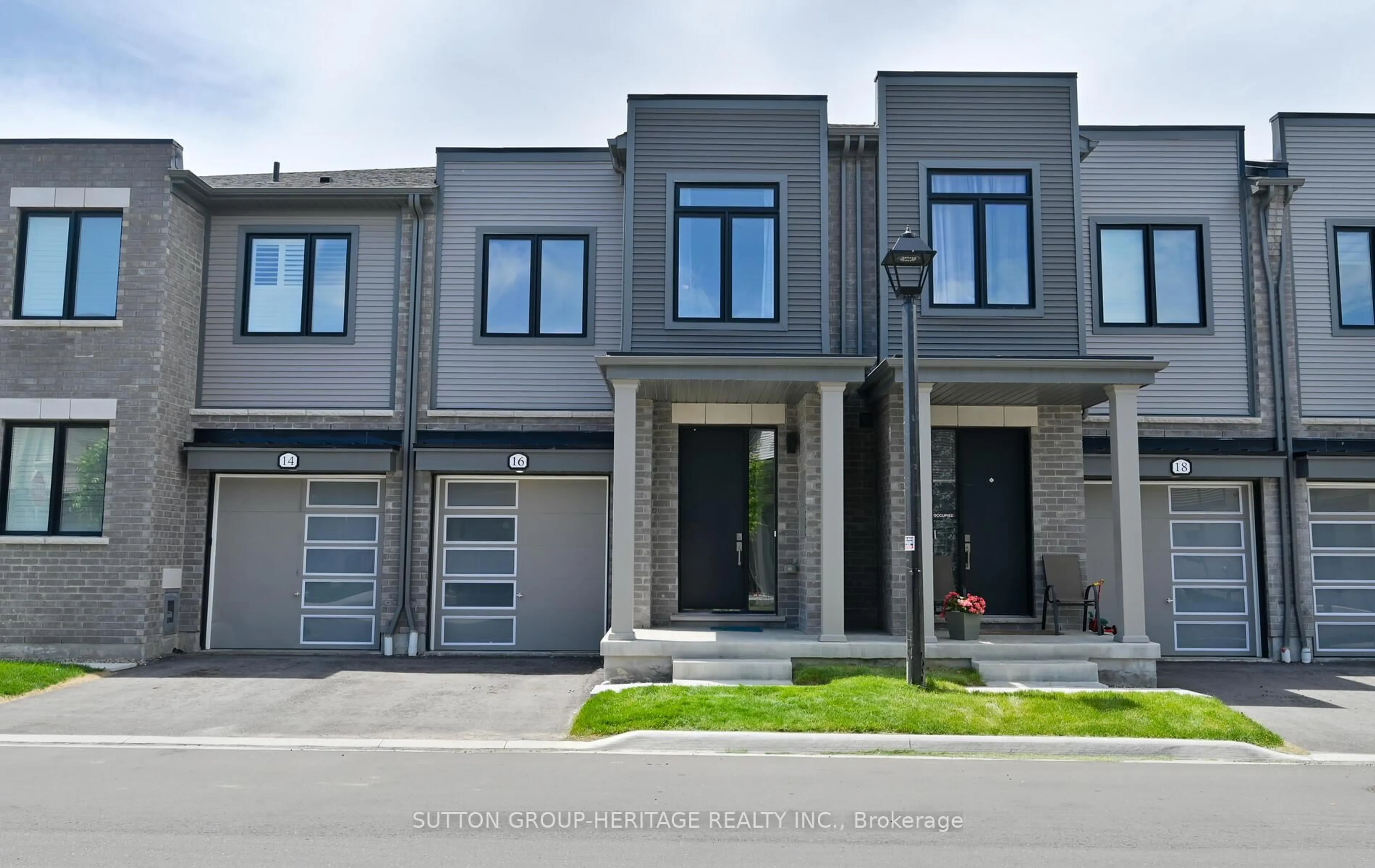 Home with brick exterior material, street for 16 Sorbara Way, Whitby Ontario L1M 2L1