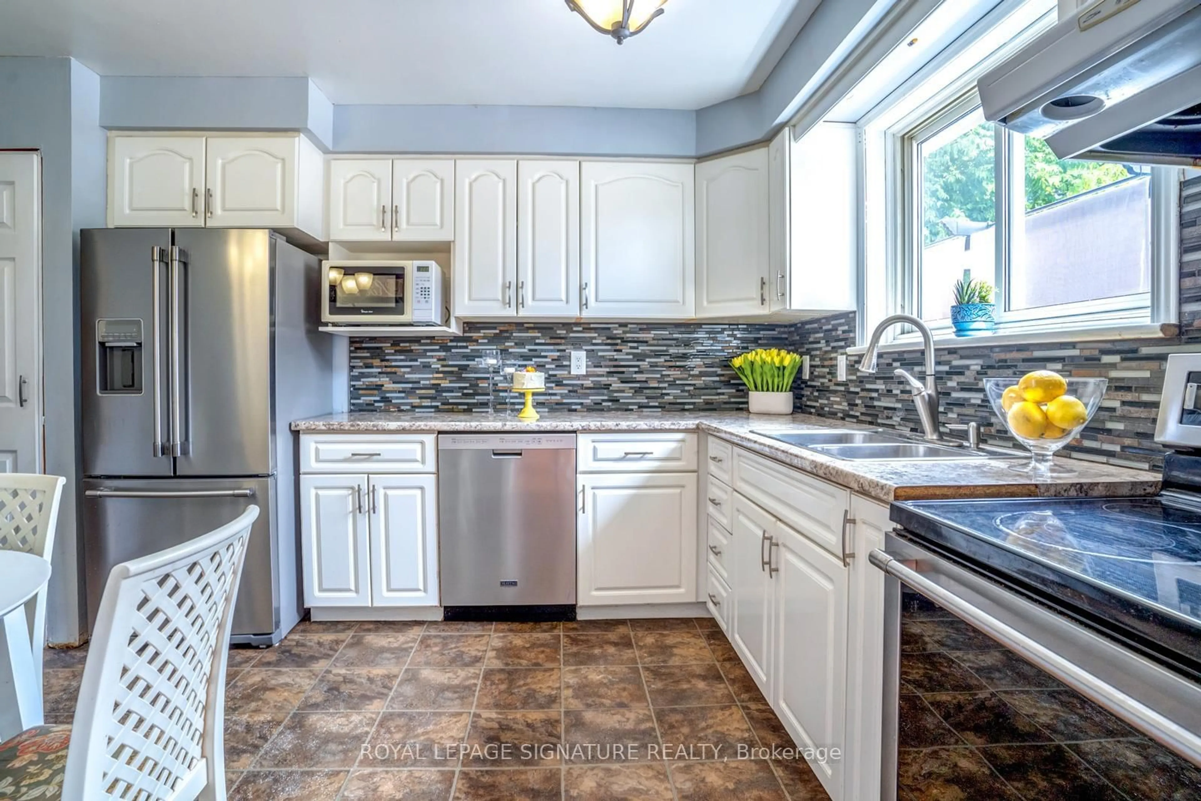 Open concept kitchen, ceramic/tile floor for 120 Nonquon Rd #44, Oshawa Ontario L1G 7E6
