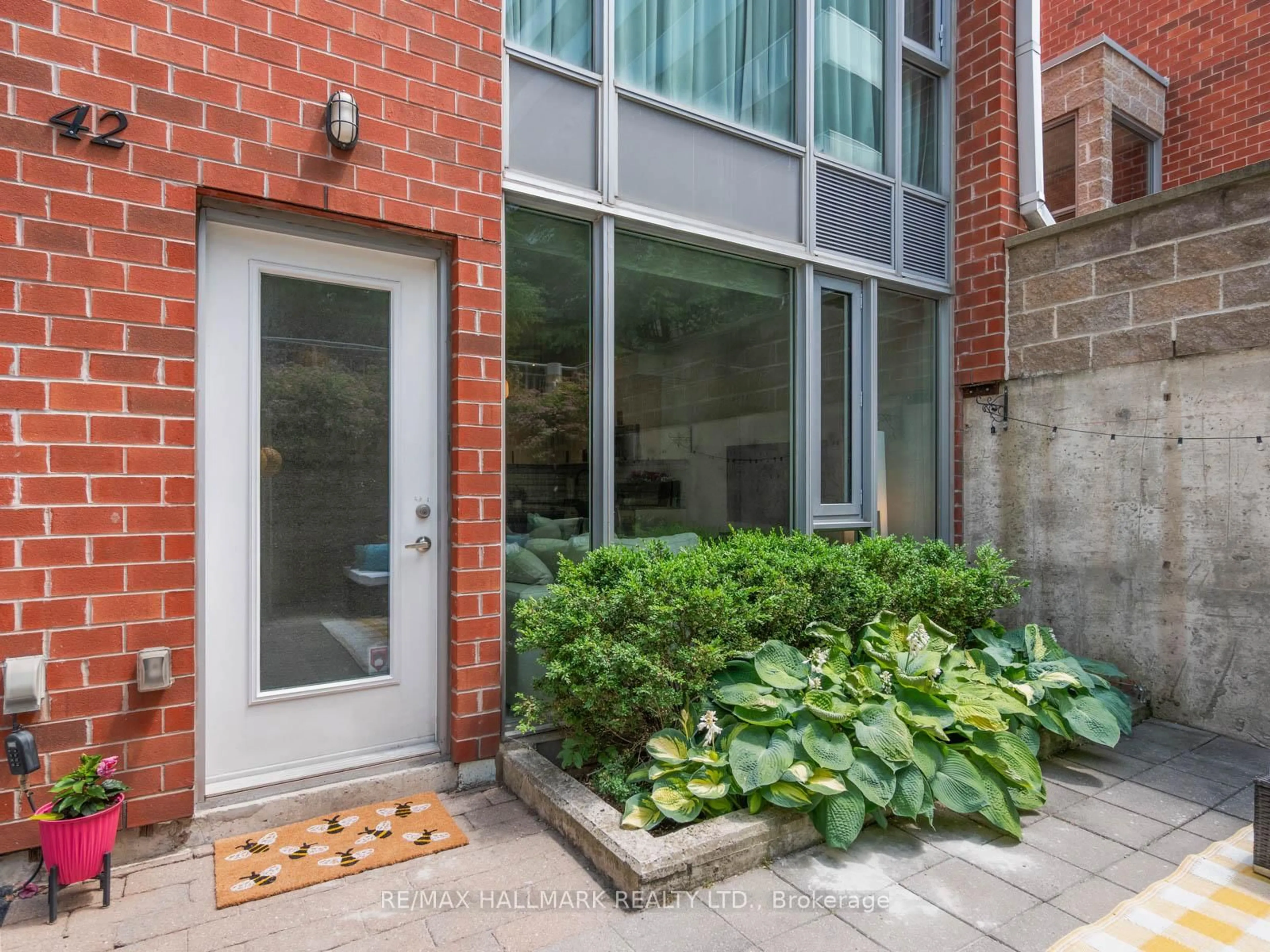 Home with brick exterior material, street for 42 Boston Ave #1, Toronto Ontario M4M 2T9