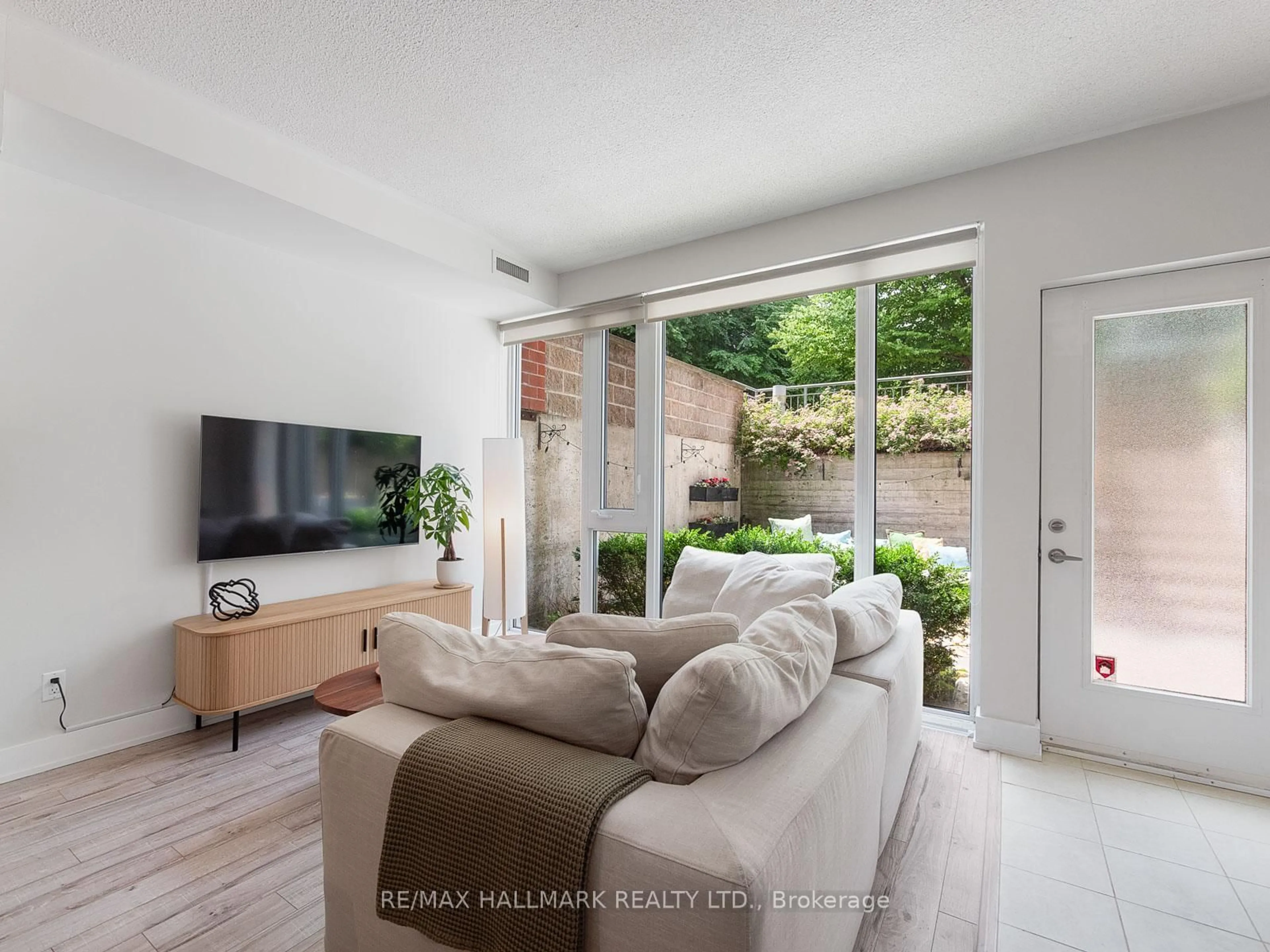 Living room with furniture, unknown for 42 Boston Ave #1, Toronto Ontario M4M 2T9