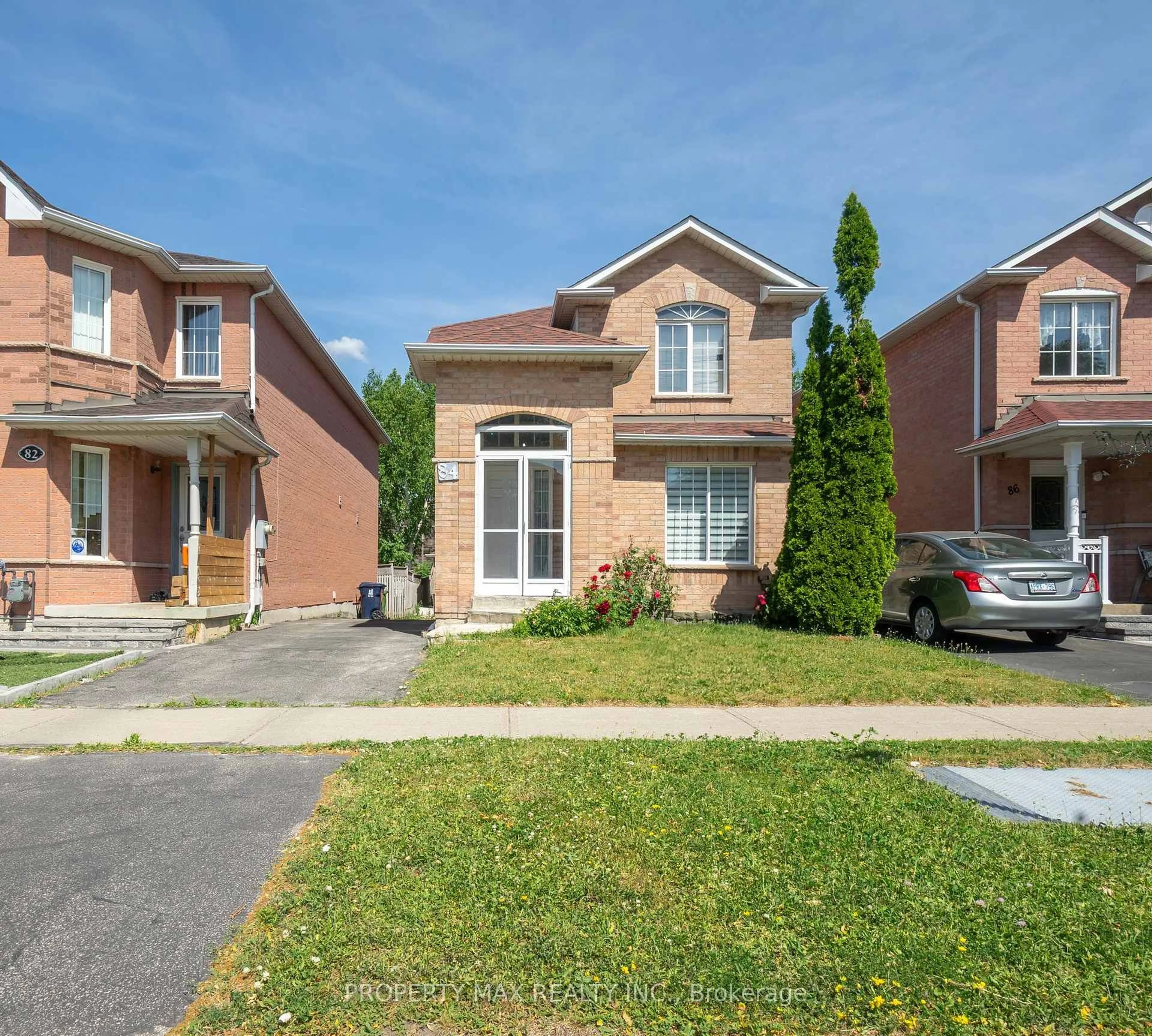 Home with brick exterior material, street for 84 Bridlegrove Dr, Toronto Ontario M1W 3W9
