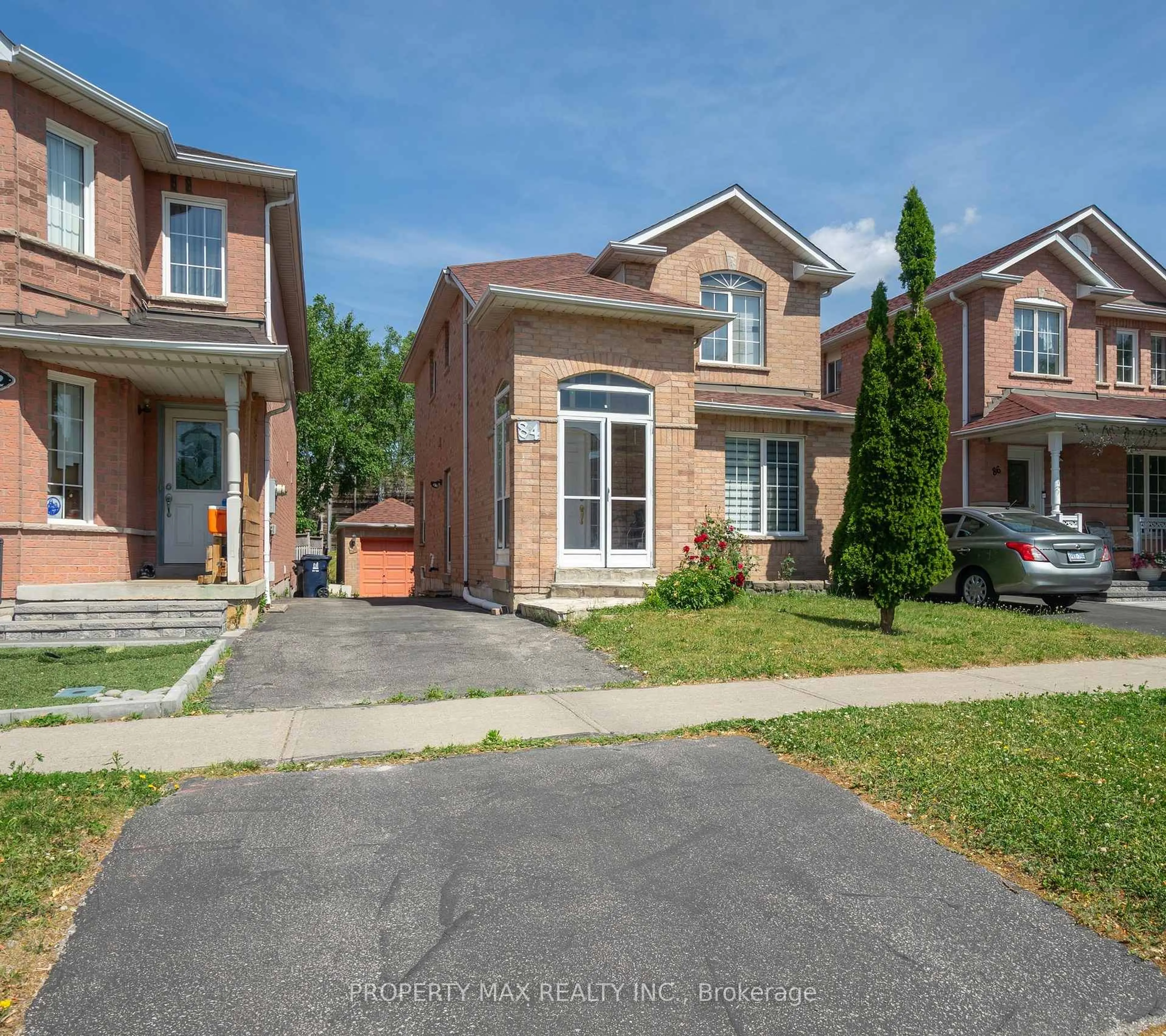 Home with brick exterior material, street for 84 Bridlegrove Dr, Toronto Ontario M1W 3W9