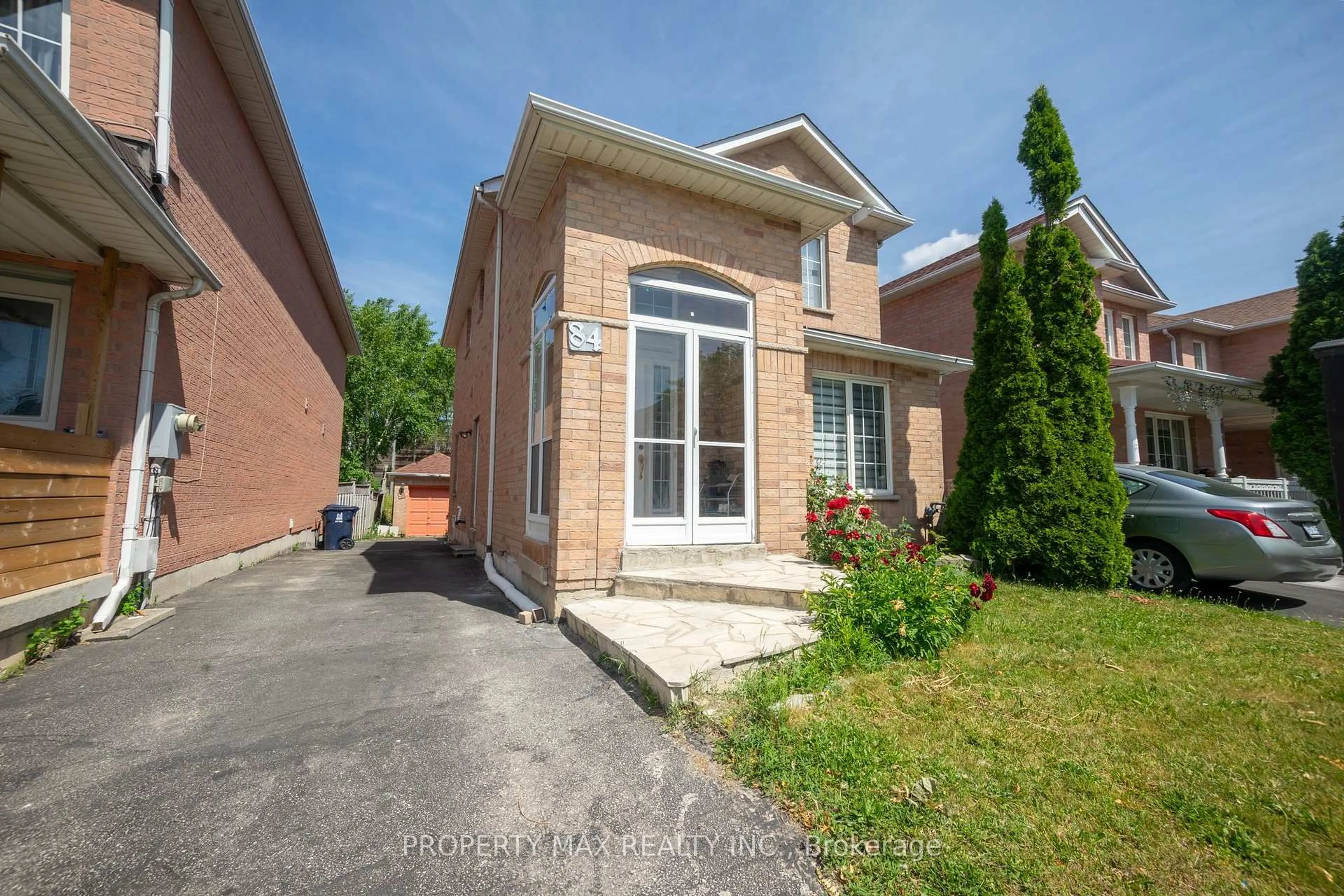 Home with brick exterior material, street for 84 Bridlegrove Dr, Toronto Ontario M1W 3W9