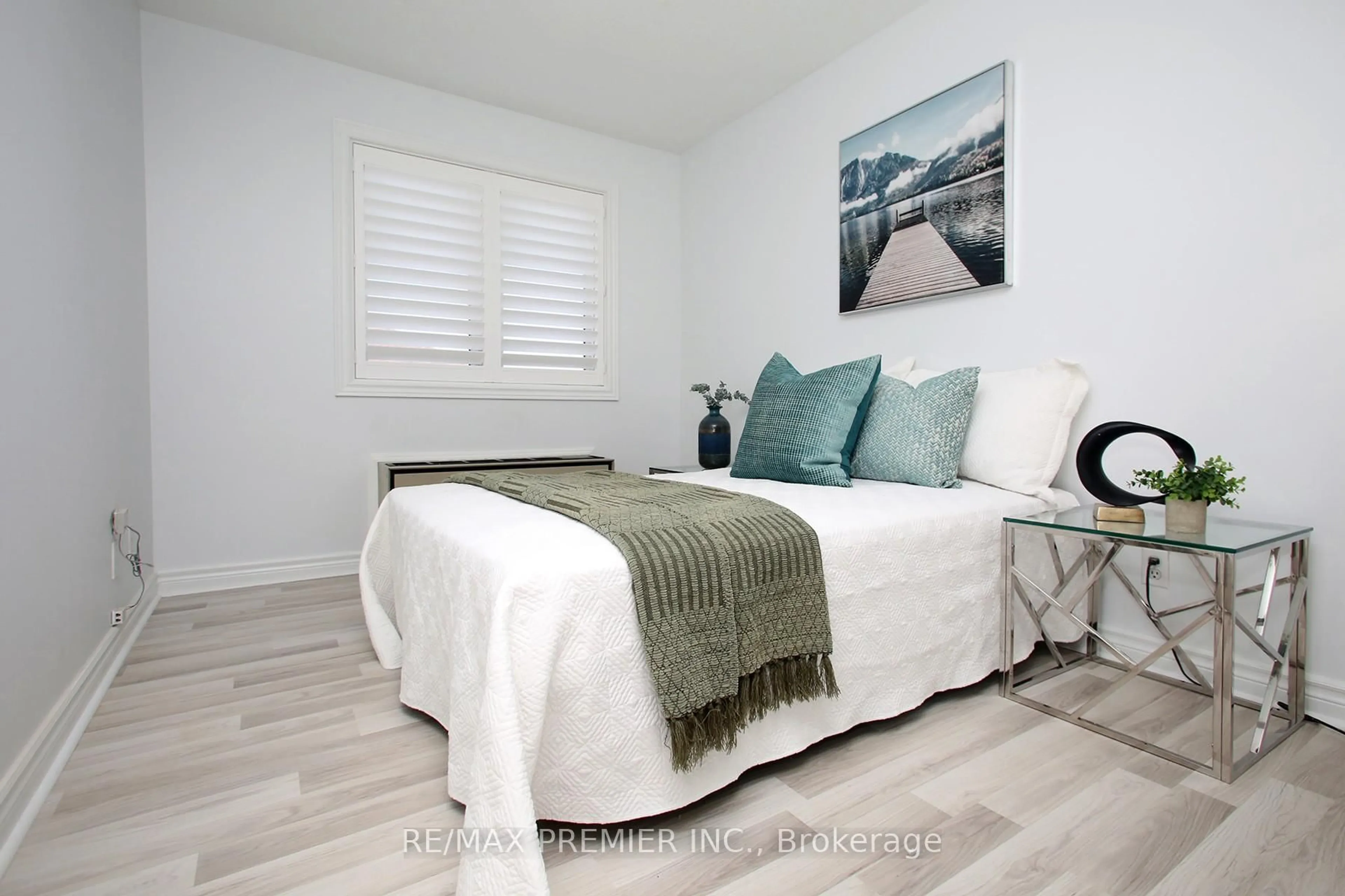 Bedroom with bed, wood/laminate floor for 189 Lake Drive Way #407, Ajax Ontario L1S 7J1