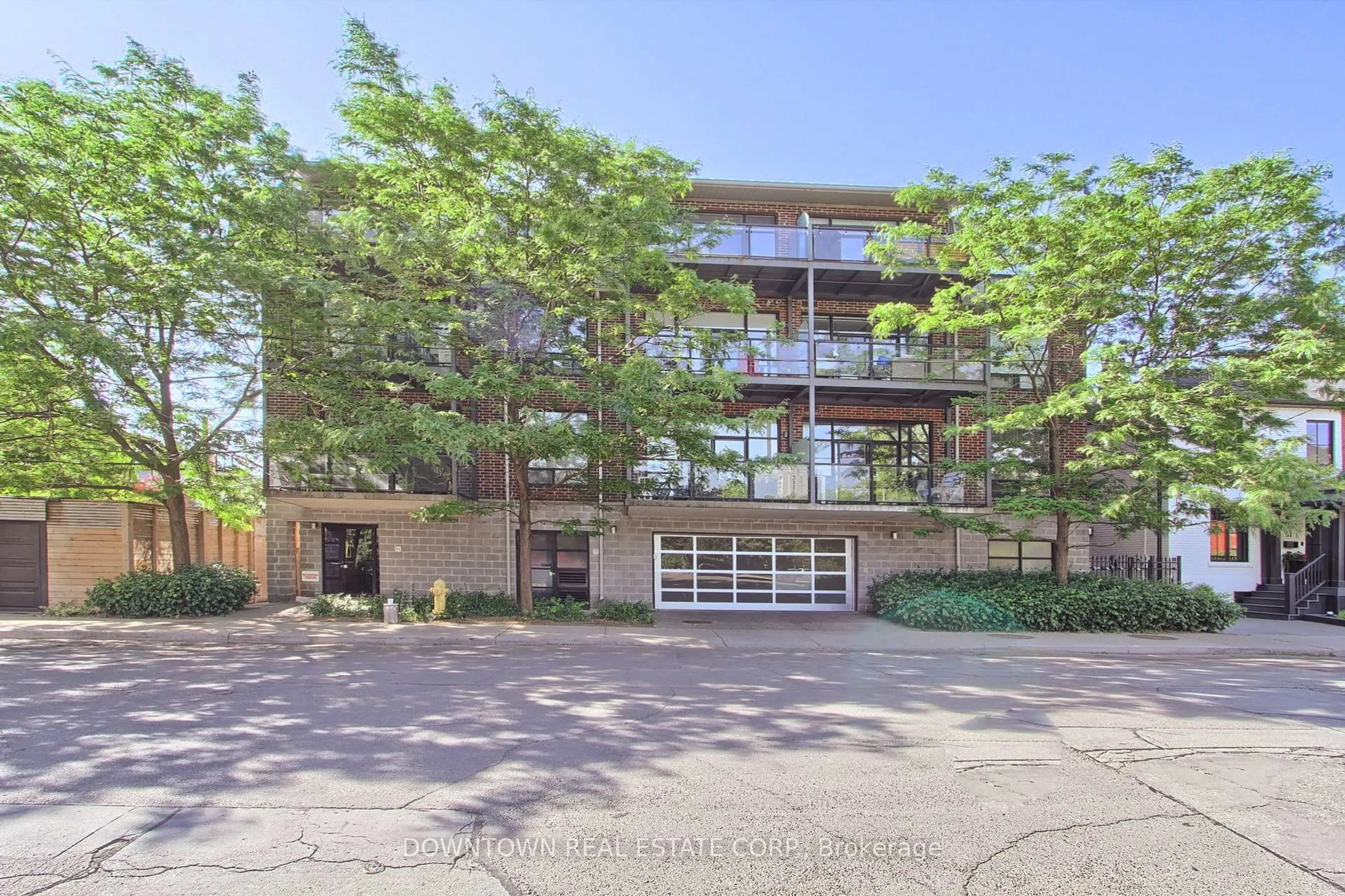 A pic from outside/outdoor area/front of a property/back of a property/a pic from drone, unknown for 53 Colgate Ave #404, Toronto Ontario M4M 1N6