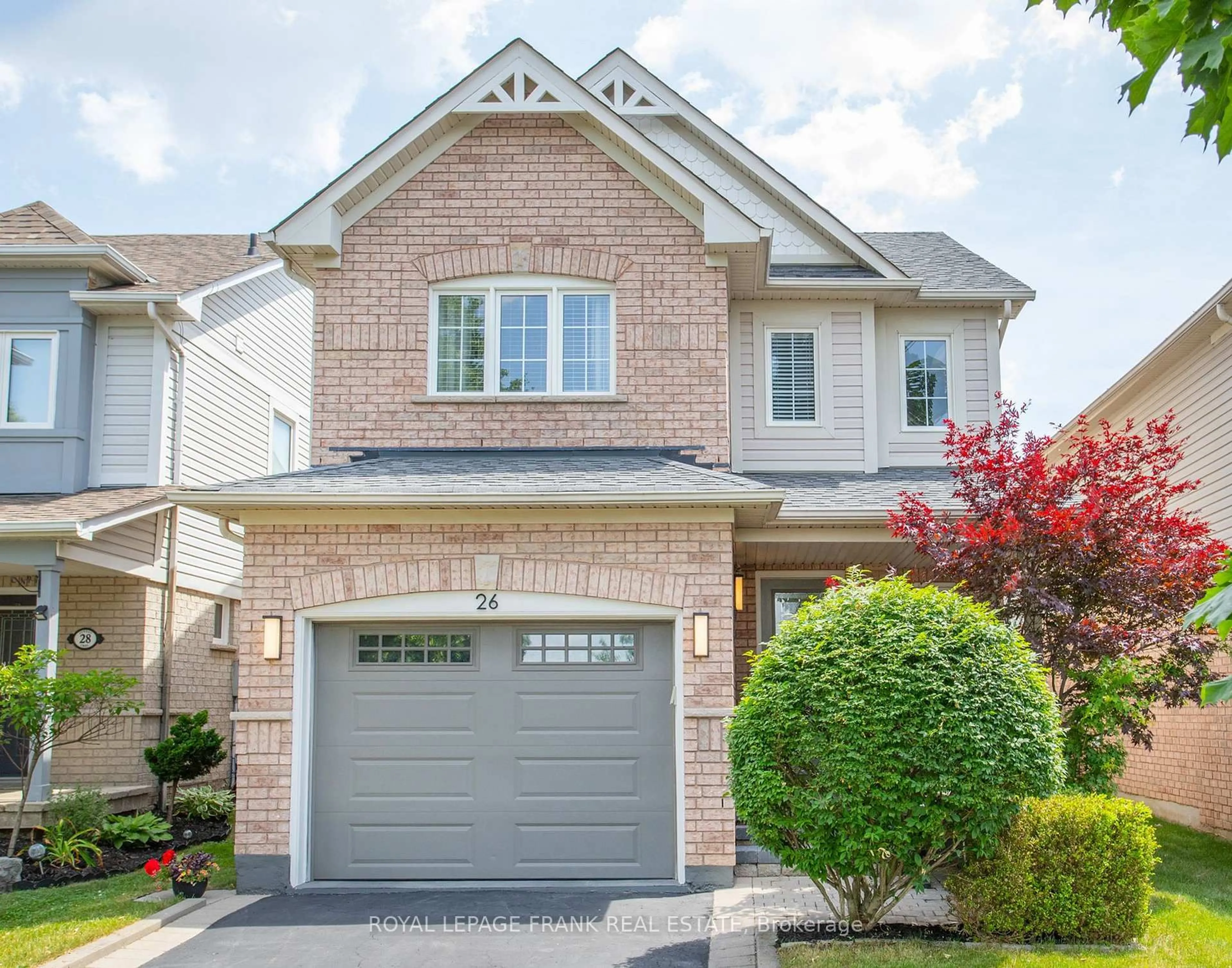Home with brick exterior material, street for 26 Juneau Cres, Whitby Ontario L1R 3A3