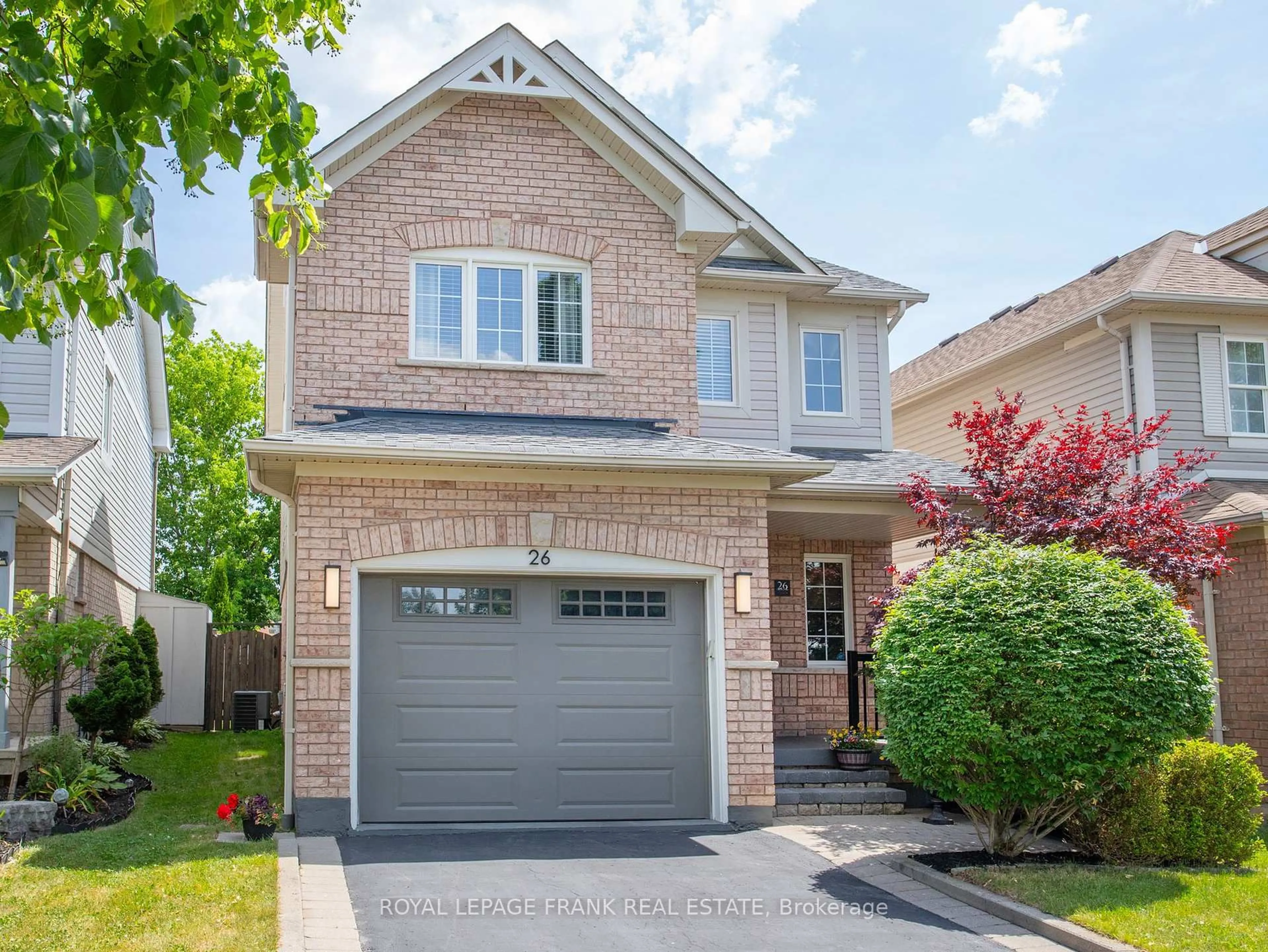 Home with brick exterior material, street for 26 Juneau Cres, Whitby Ontario L1R 3A3