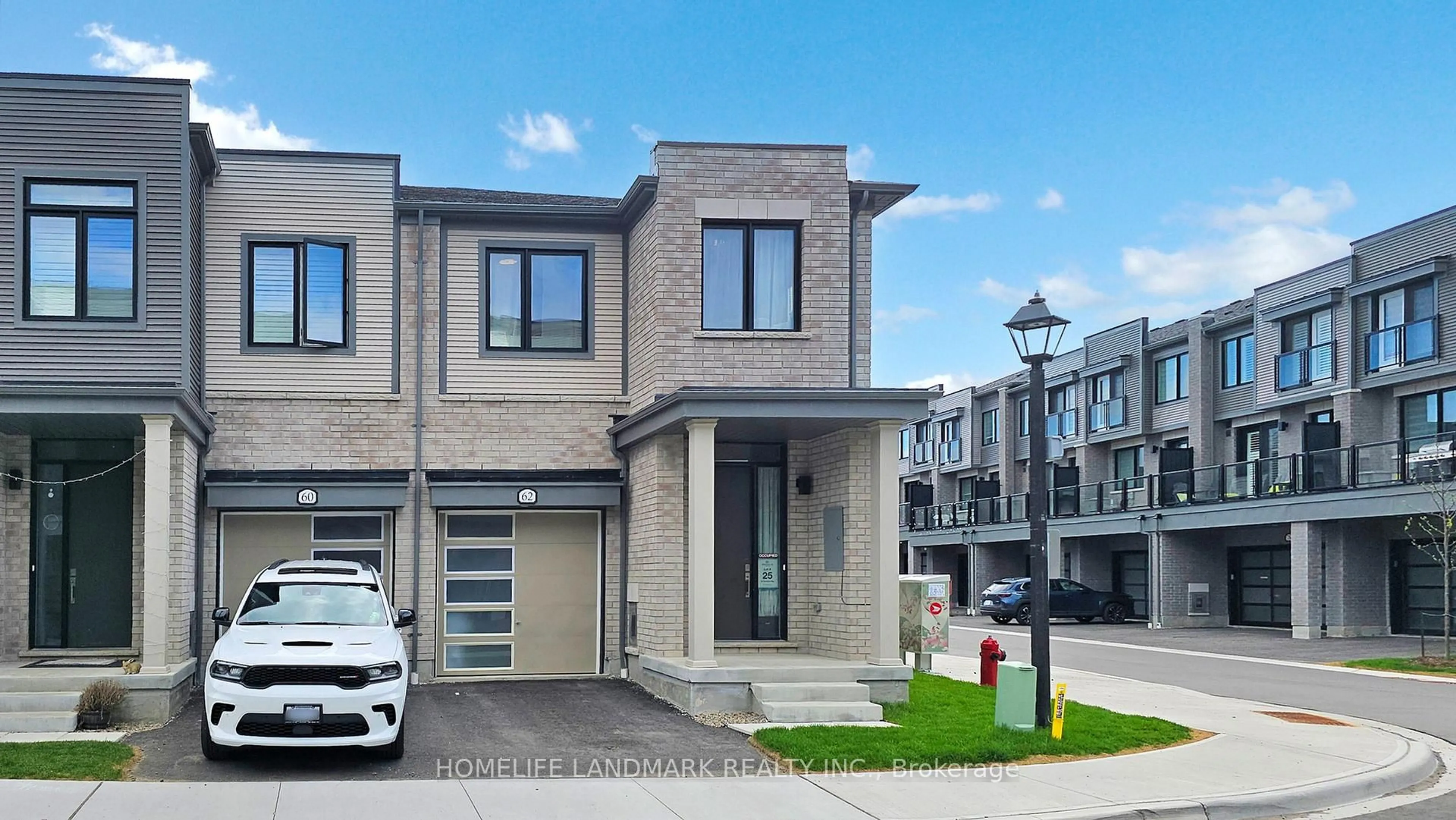 Home with brick exterior material, street for 62 Sorbara Way, Whitby Ontario L1M 0M4