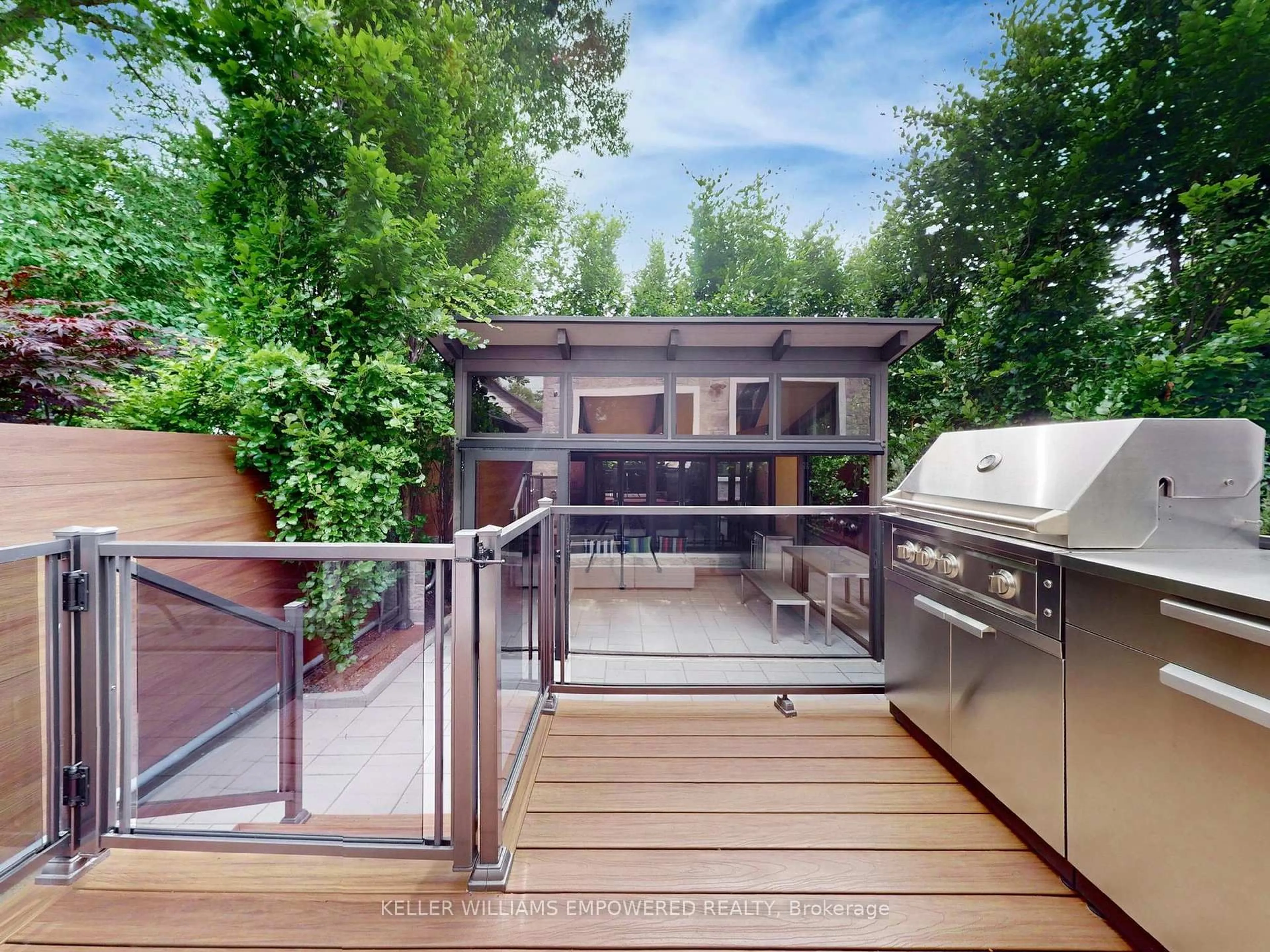 Contemporary kitchen, wood/laminate floor for 330 Cedarvale Ave, Toronto Ontario M4C 4K4