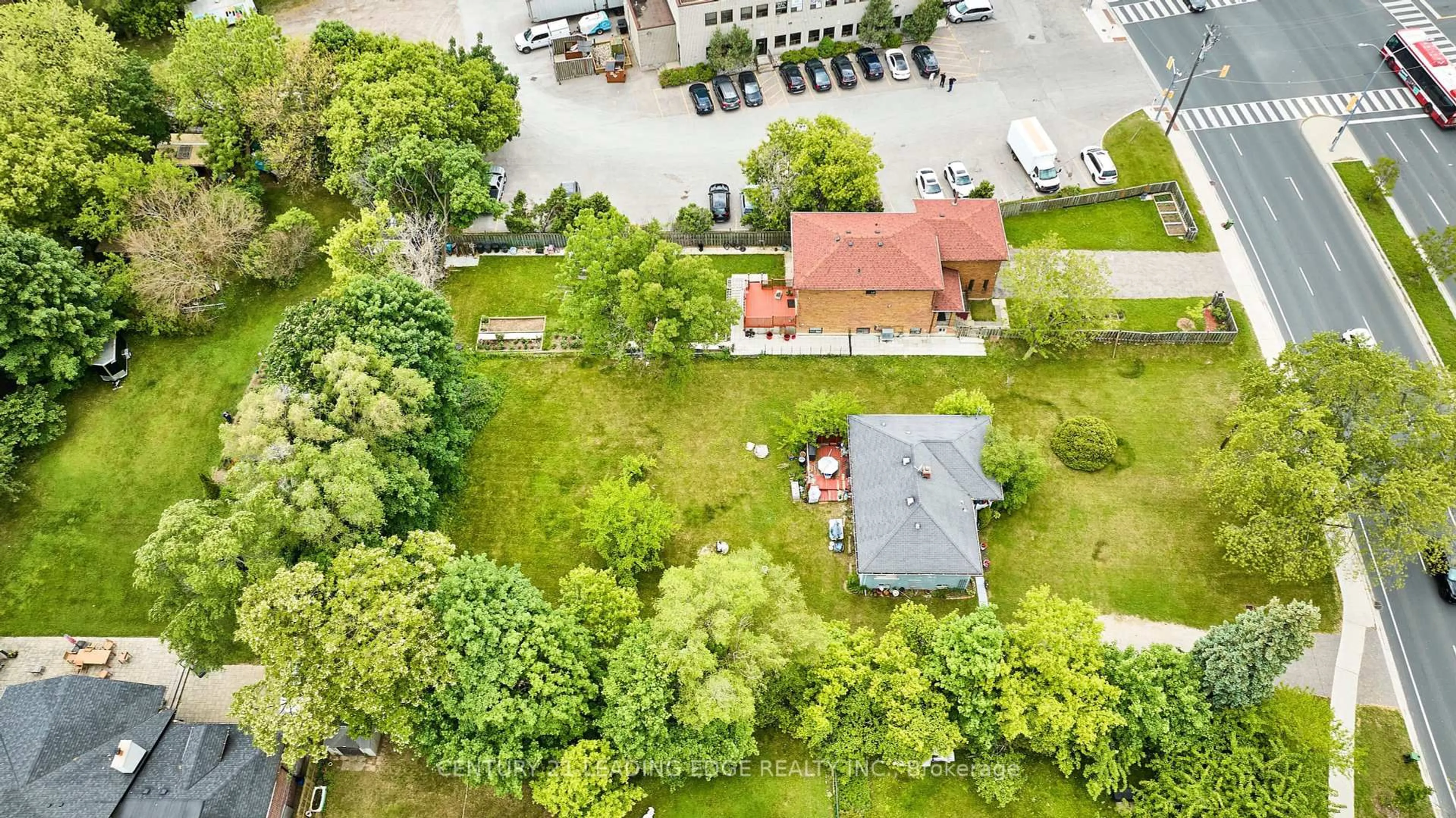 A pic from outside/outdoor area/front of a property/back of a property/a pic from drone, street for 4607 Kingston Rd, Toronto Ontario M1E 2P3