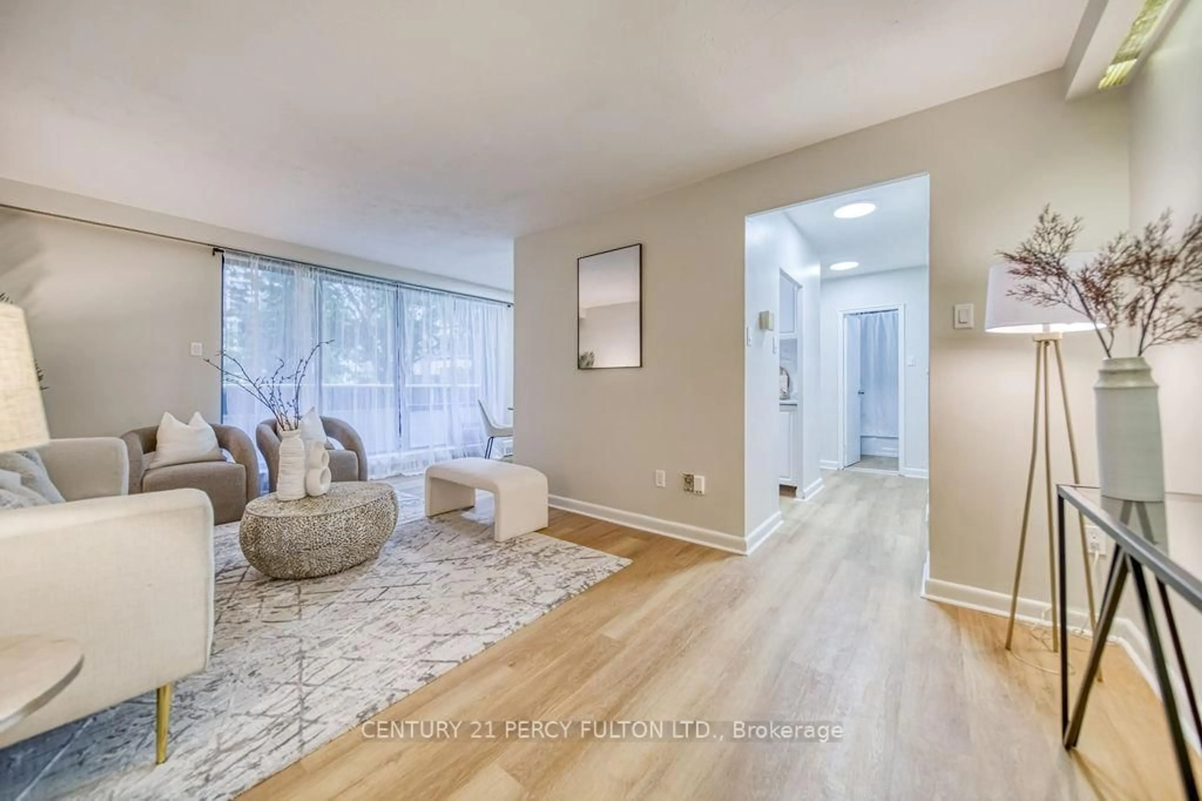 Living room with furniture, unknown for 921 Midland Ave #101, Toronto Ontario M1K 4G2