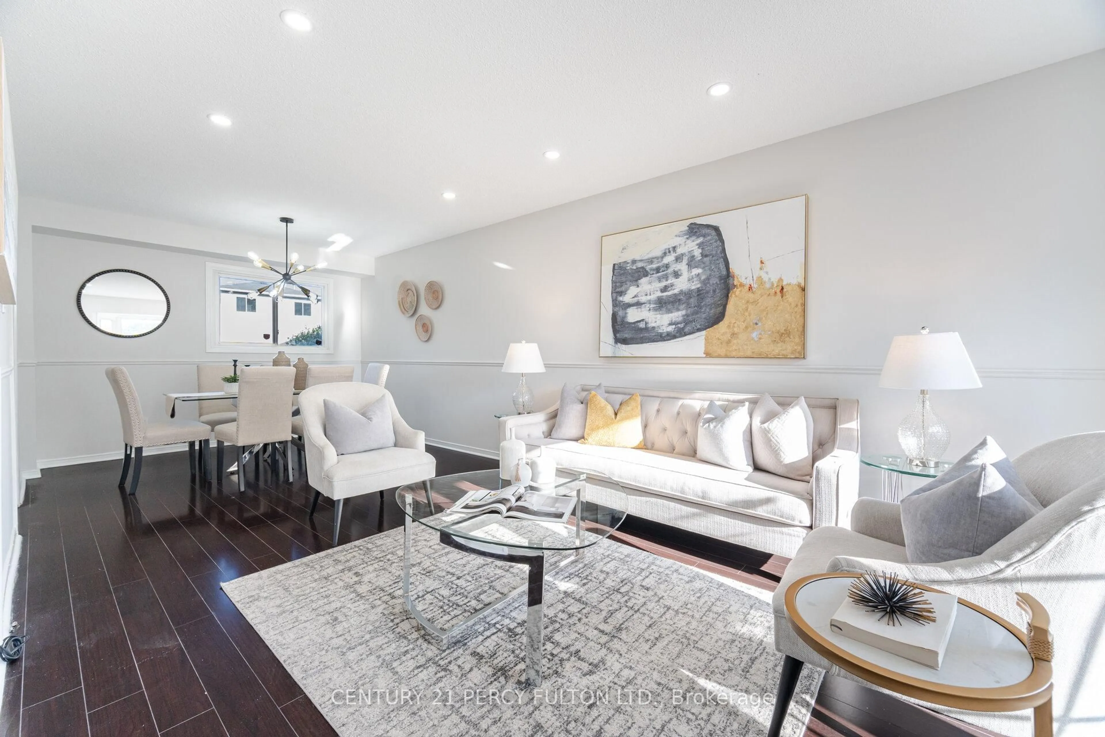 Living room with furniture, wood/laminate floor for 53 Barnes Dr, Ajax Ontario L1S 5G6