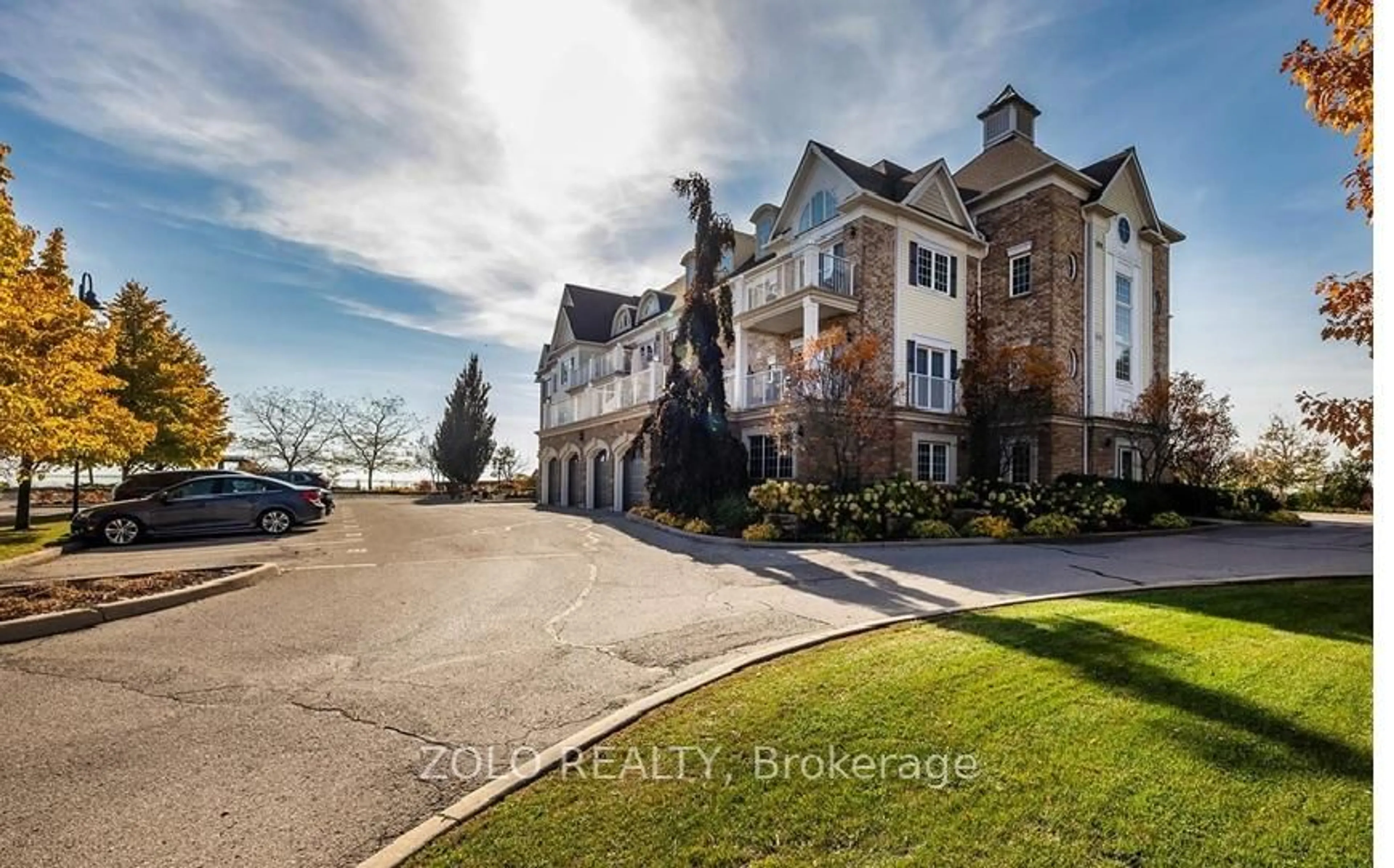 A pic from outside/outdoor area/front of a property/back of a property/a pic from drone, unknown for 395 Lakebreeze Dr #301, Clarington Ontario L1B 0A5