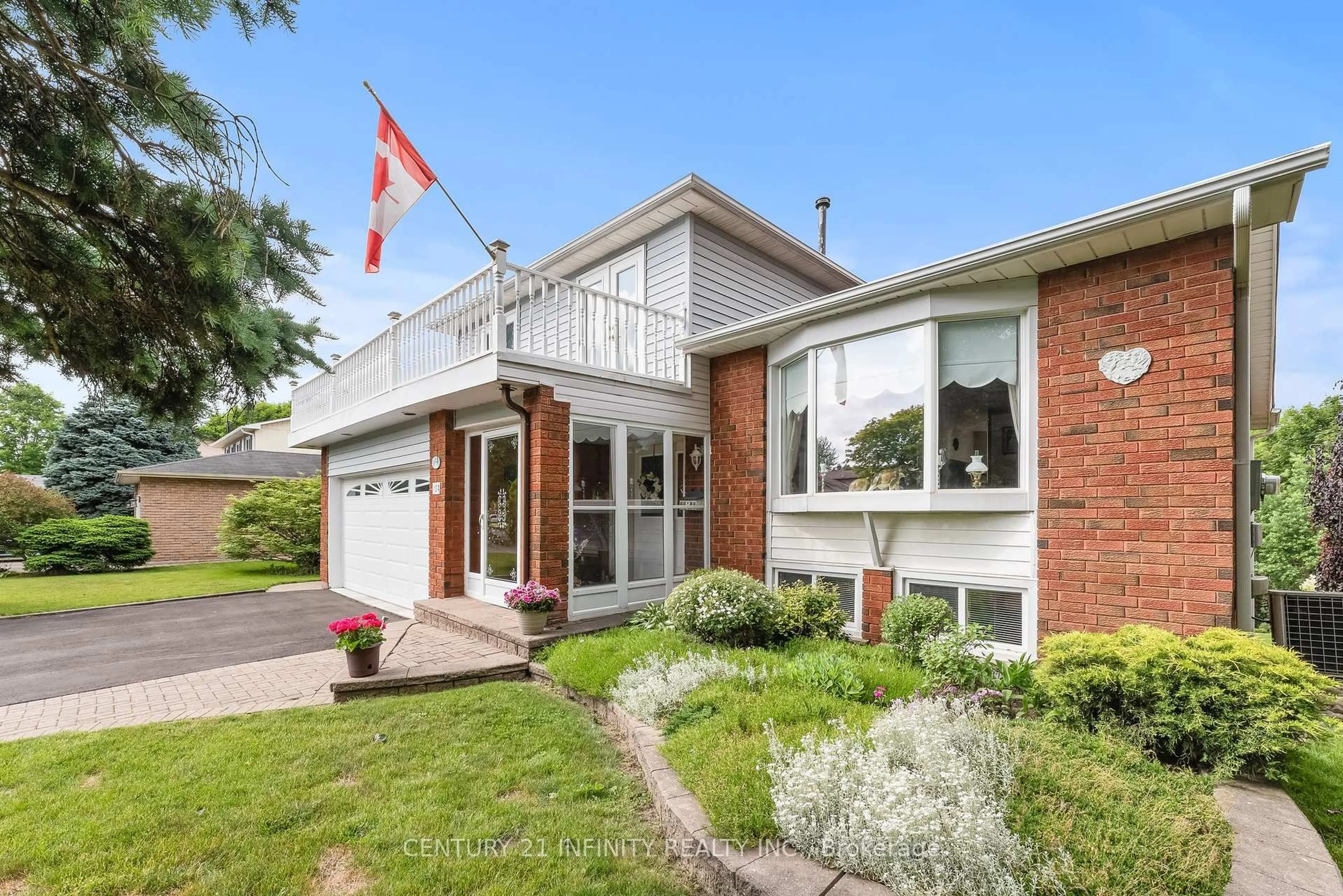 Home with brick exterior material, street for 104 Frost Dr, Whitby Ontario L1P 1C9
