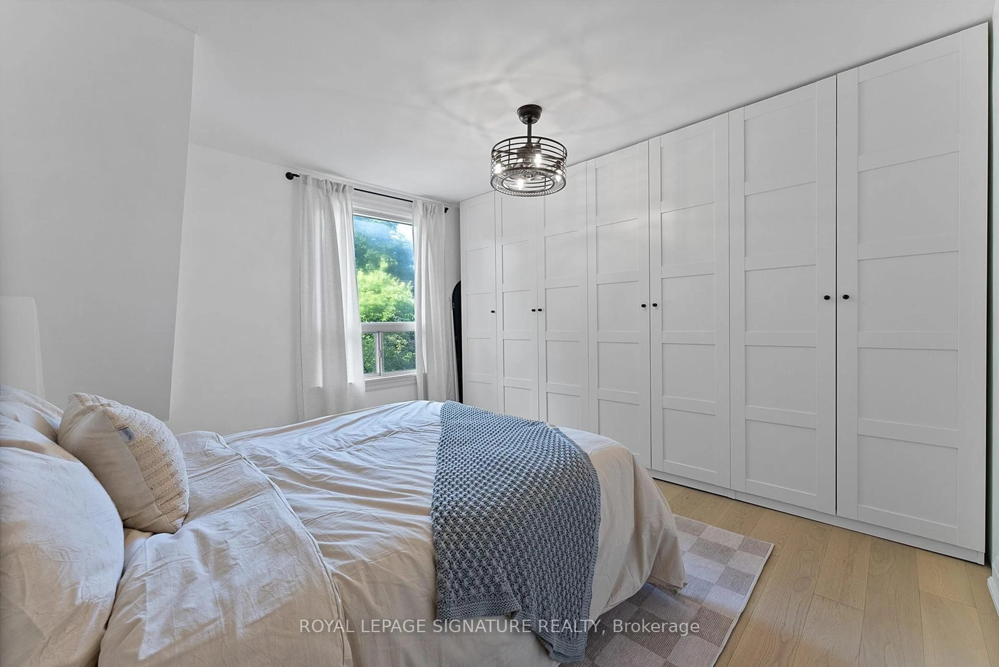 Bedroom with bed, unknown for 209 Eastwood Rd, Toronto Ontario M4L 2E2