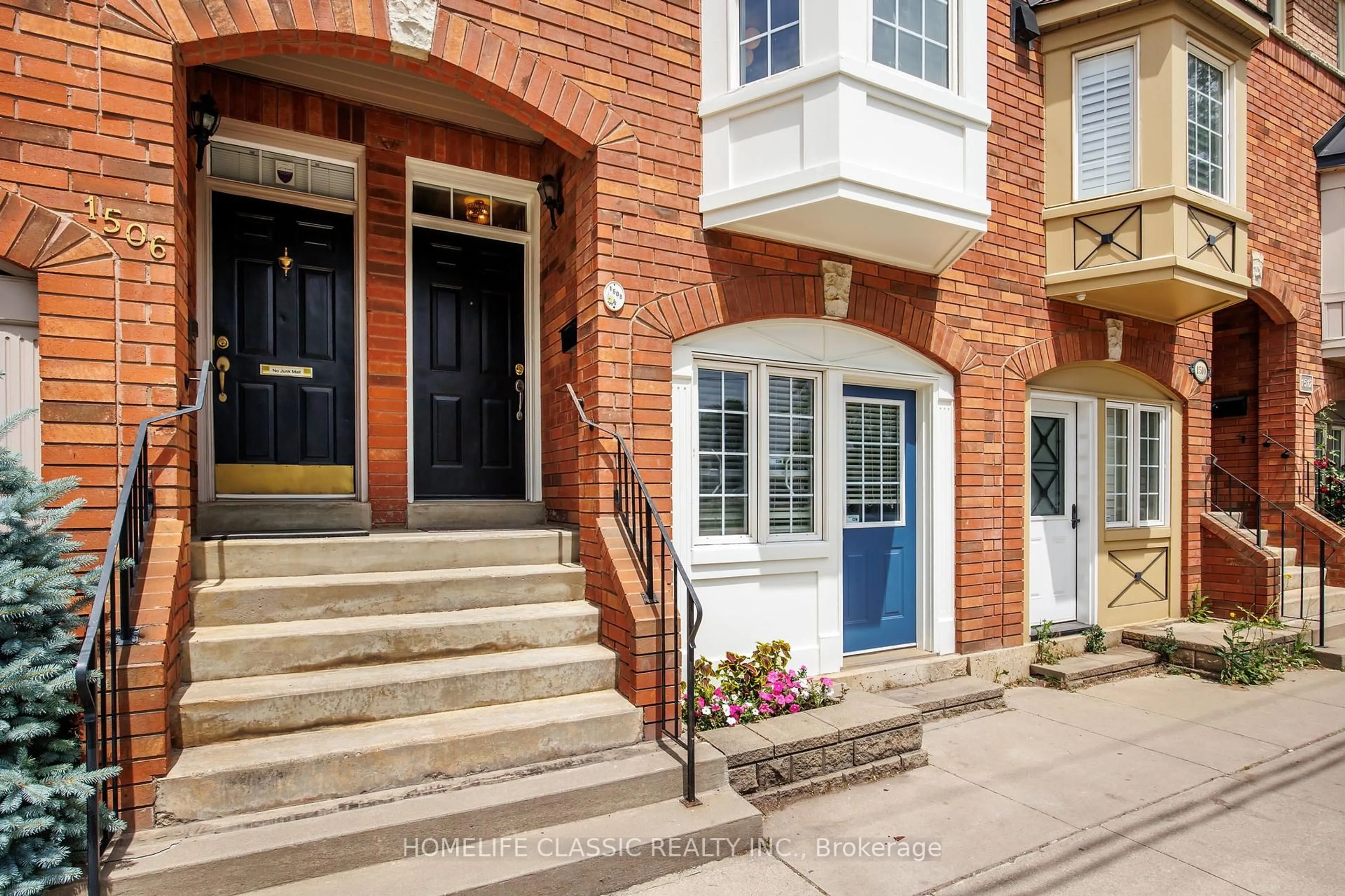 Home with brick exterior material, street for 1508 Queen St, Toronto Ontario M4L 1E3