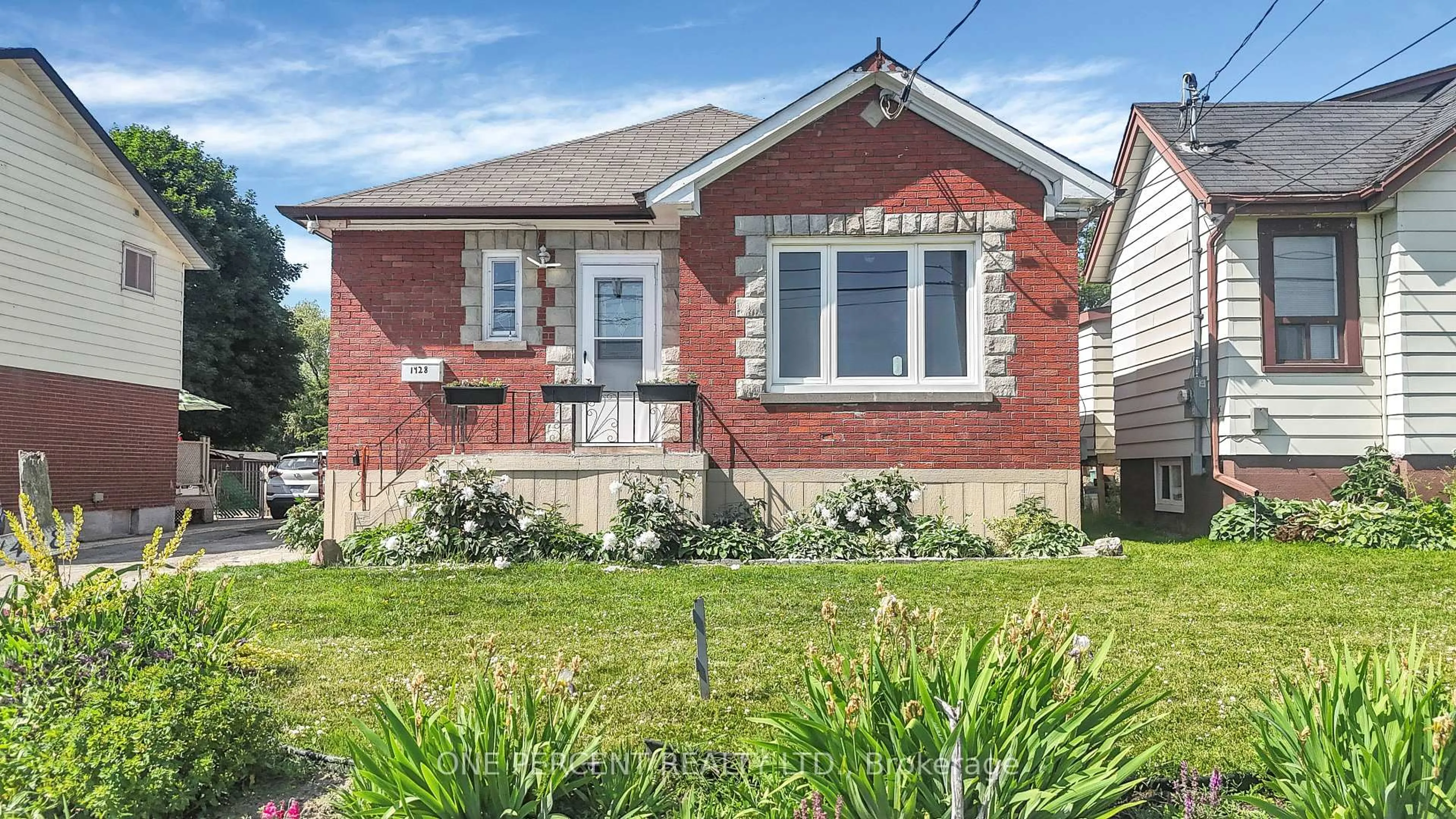 Home with brick exterior material, street for 1428 Simcoe St, Oshawa Ontario L1H 4M4