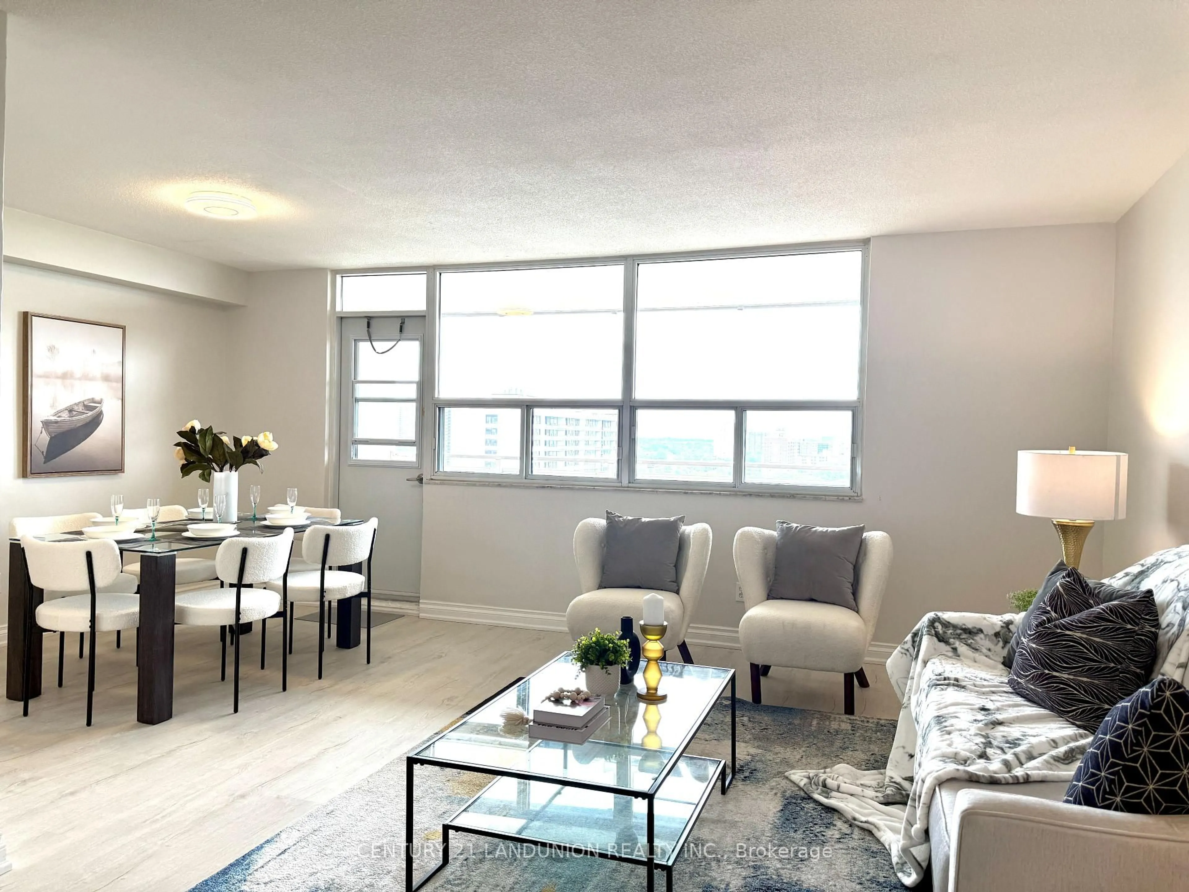 Living room with furniture, unknown for 2550 Pharmacy Ave #1211, Toronto Ontario M1W 1H9