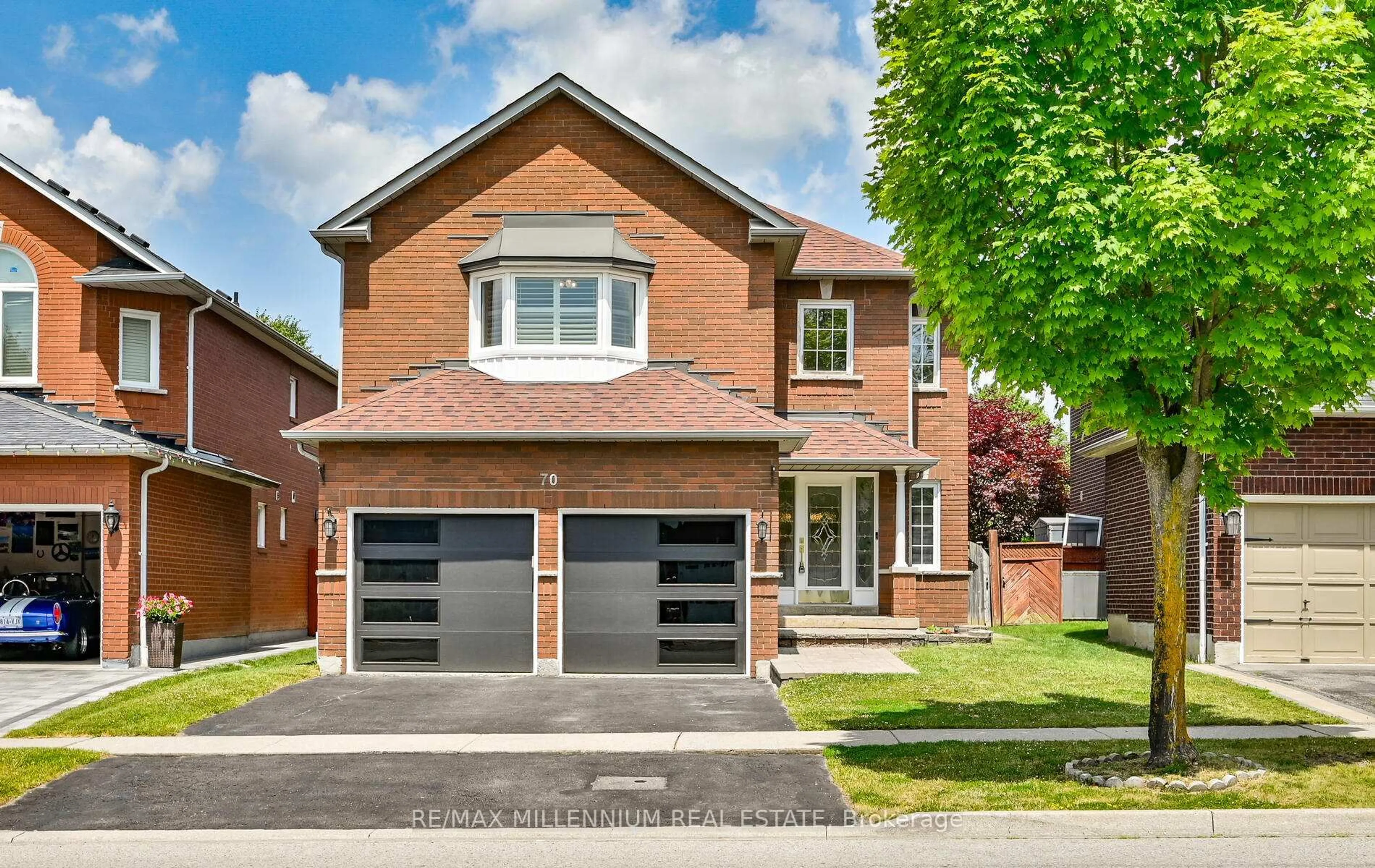 Home with brick exterior material, street for 70 Strickland Dr, Ajax Ontario L1T 4A3