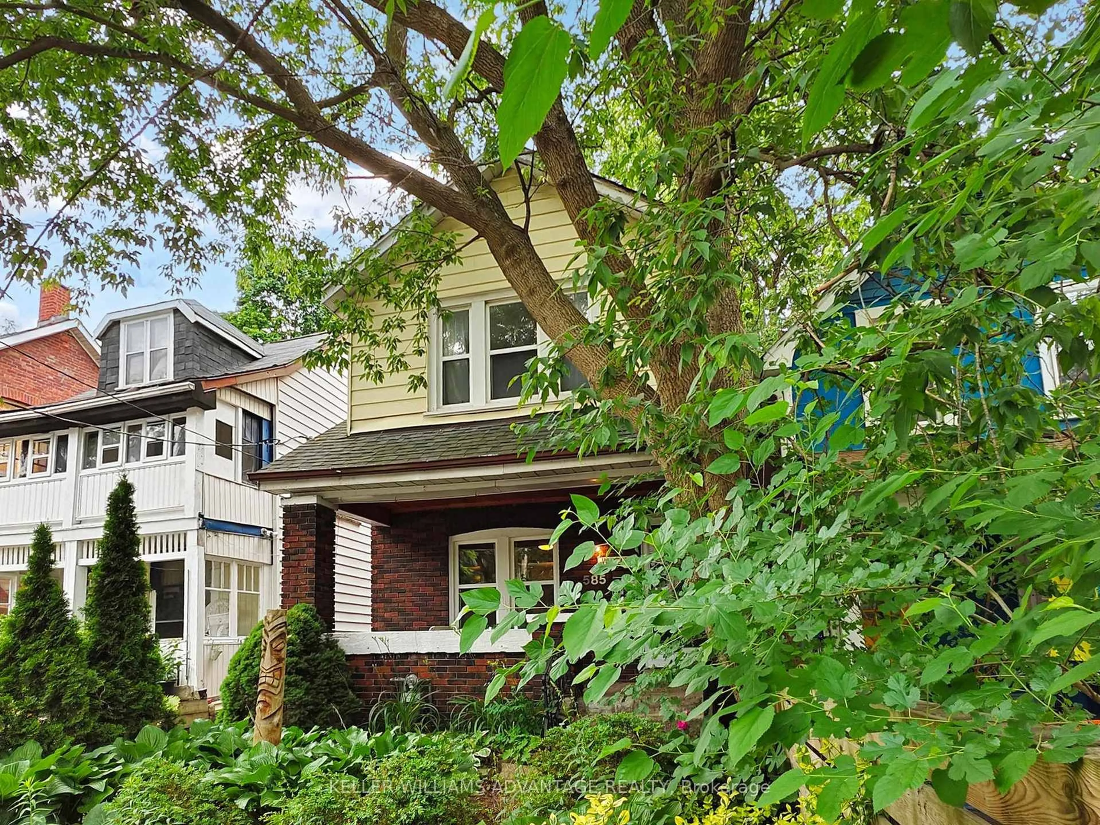 Home with brick exterior material, street for 585 Woodbine Ave, Toronto Ontario M4E 2H9