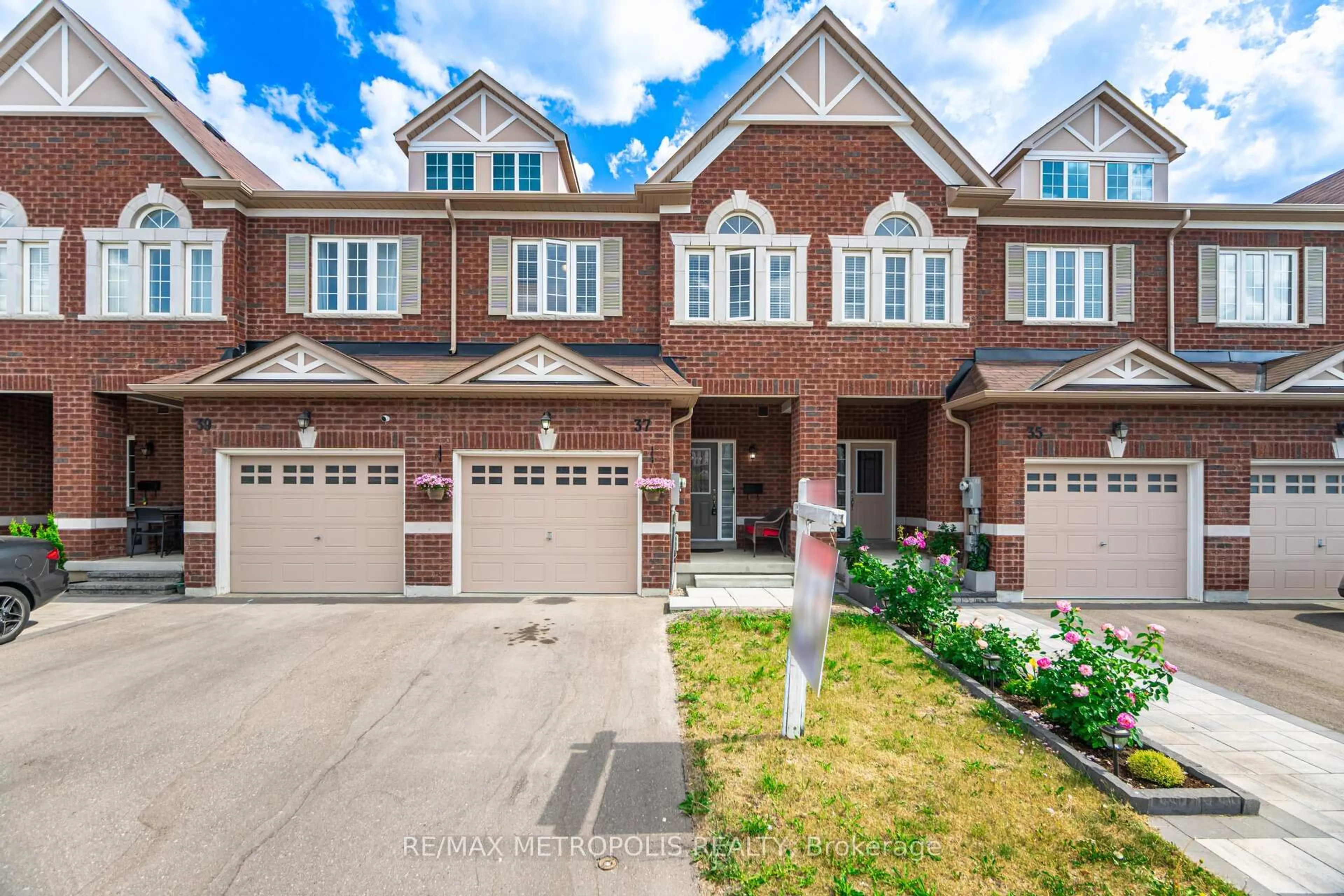 Home with brick exterior material, street for 37 Jevons Dr, Ajax Ontario L1Z 0T5