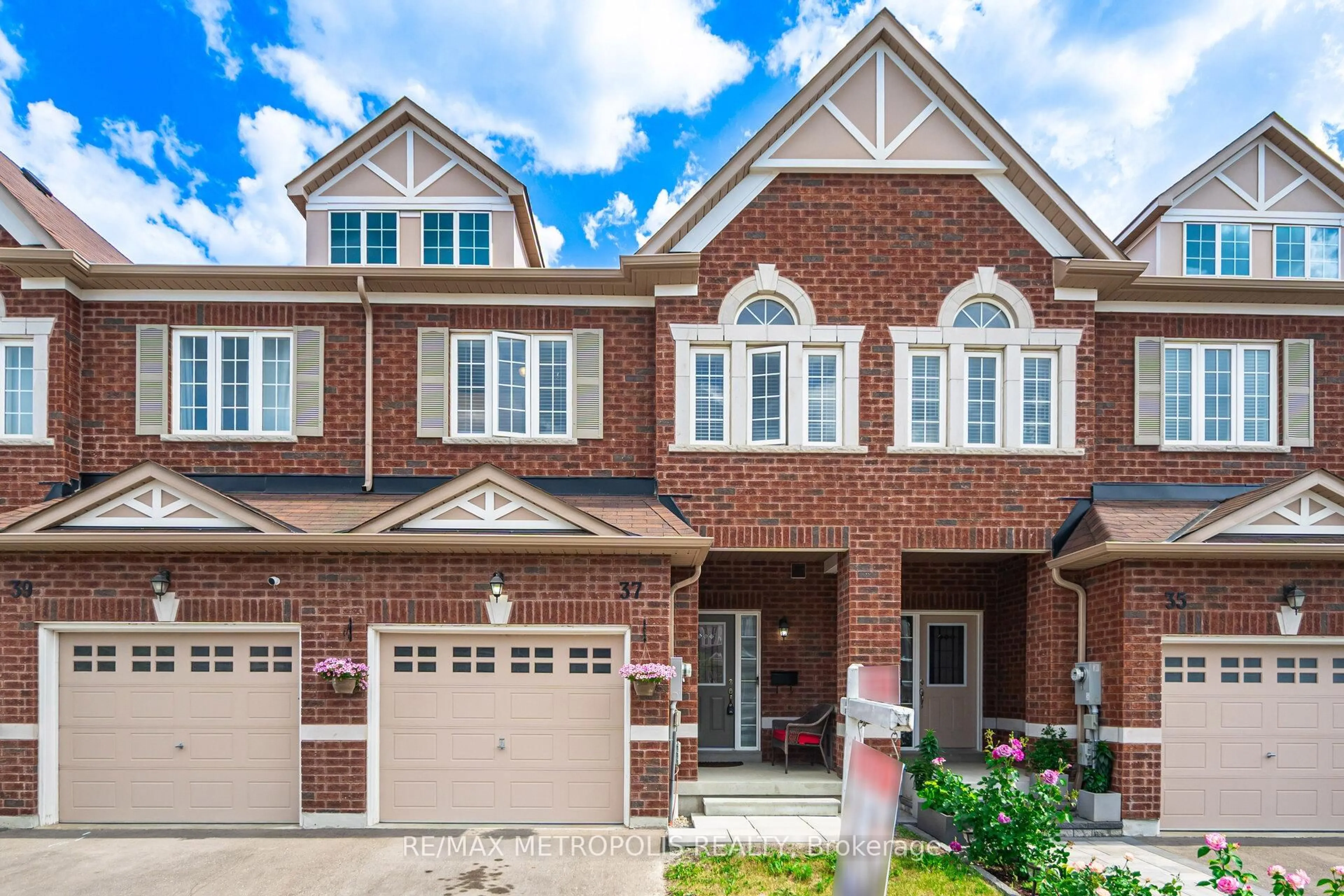 Home with brick exterior material, street for 37 Jevons Dr, Ajax Ontario L1Z 0T5