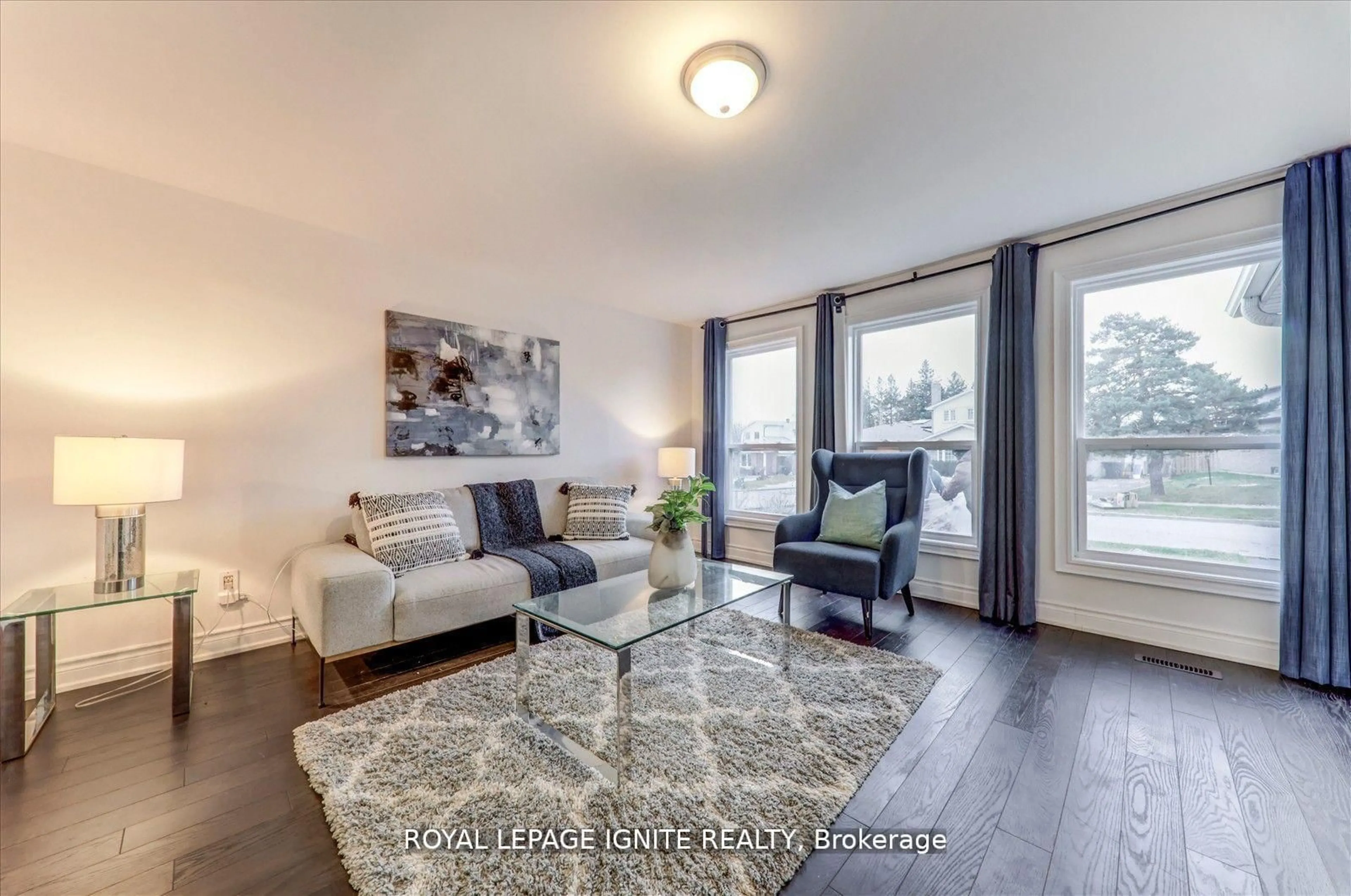 Living room with furniture, wood/laminate floor for 50 Bridley Dr, Toronto Ontario M1V 1A9