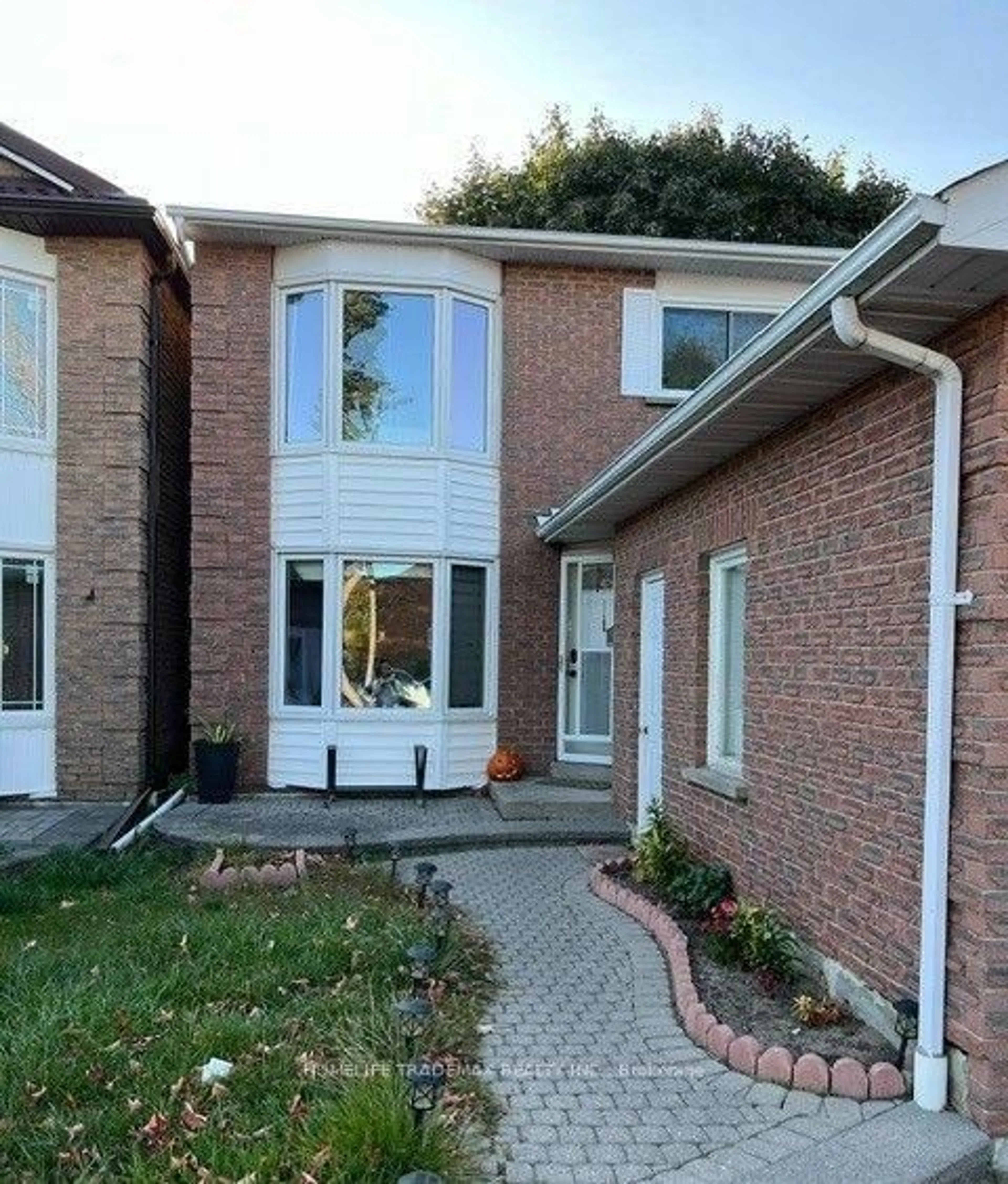 Home with brick exterior material, street for 49 Halfmoon Sq, Toronto Ontario M1C 3V4