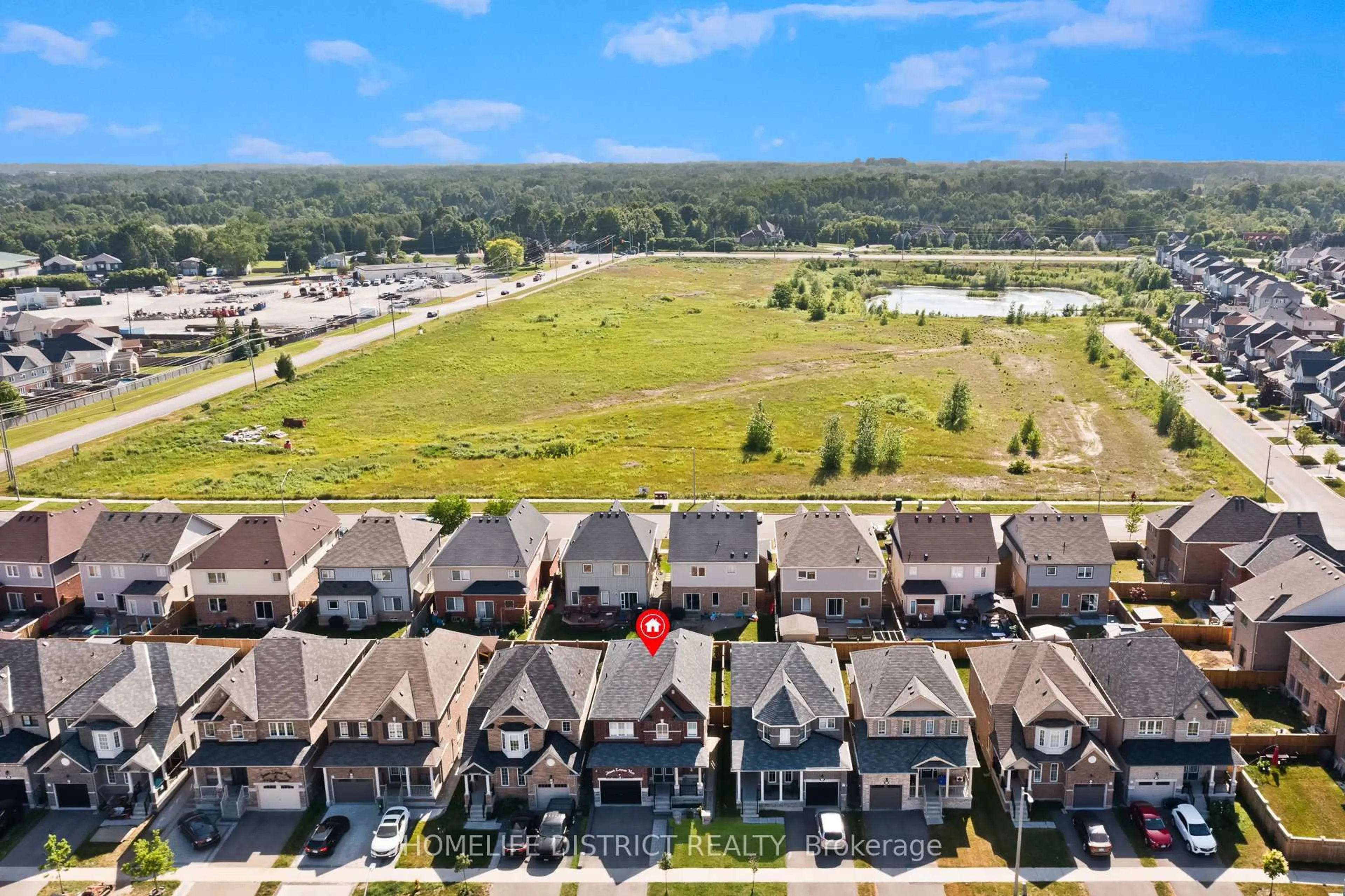 A pic from outside/outdoor area/front of a property/back of a property/a pic from drone, mountain view for 22 Tait Cres, Clarington Ontario L1C 7G7