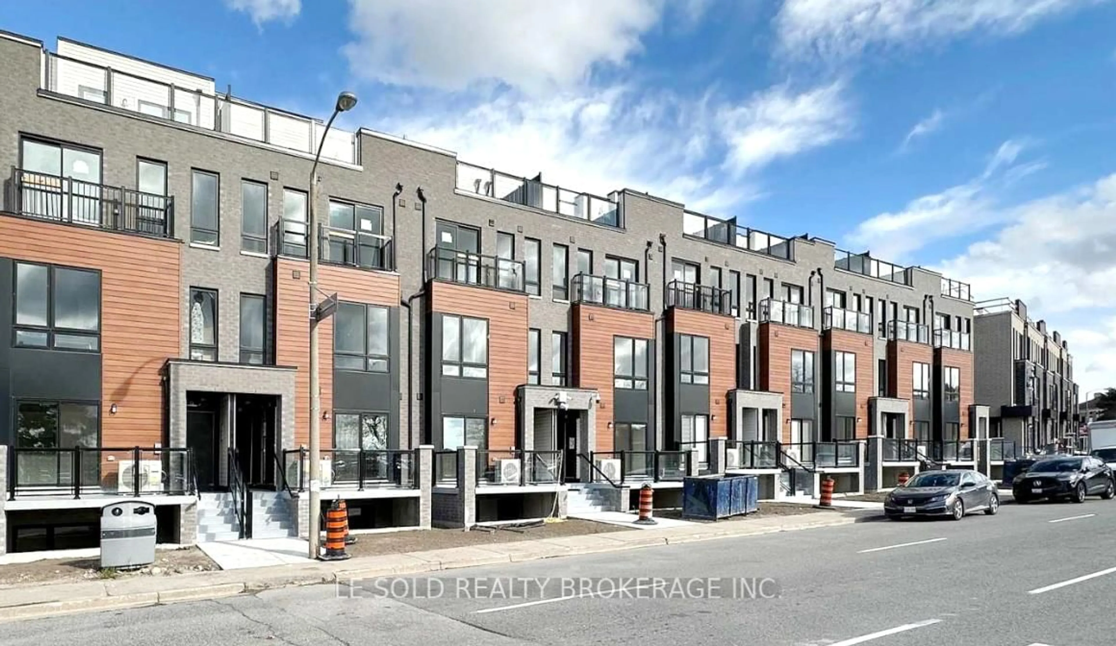 Home with brick exterior material, street for 145 Tapscott Rd #32, Toronto Ontario M1B 0E8