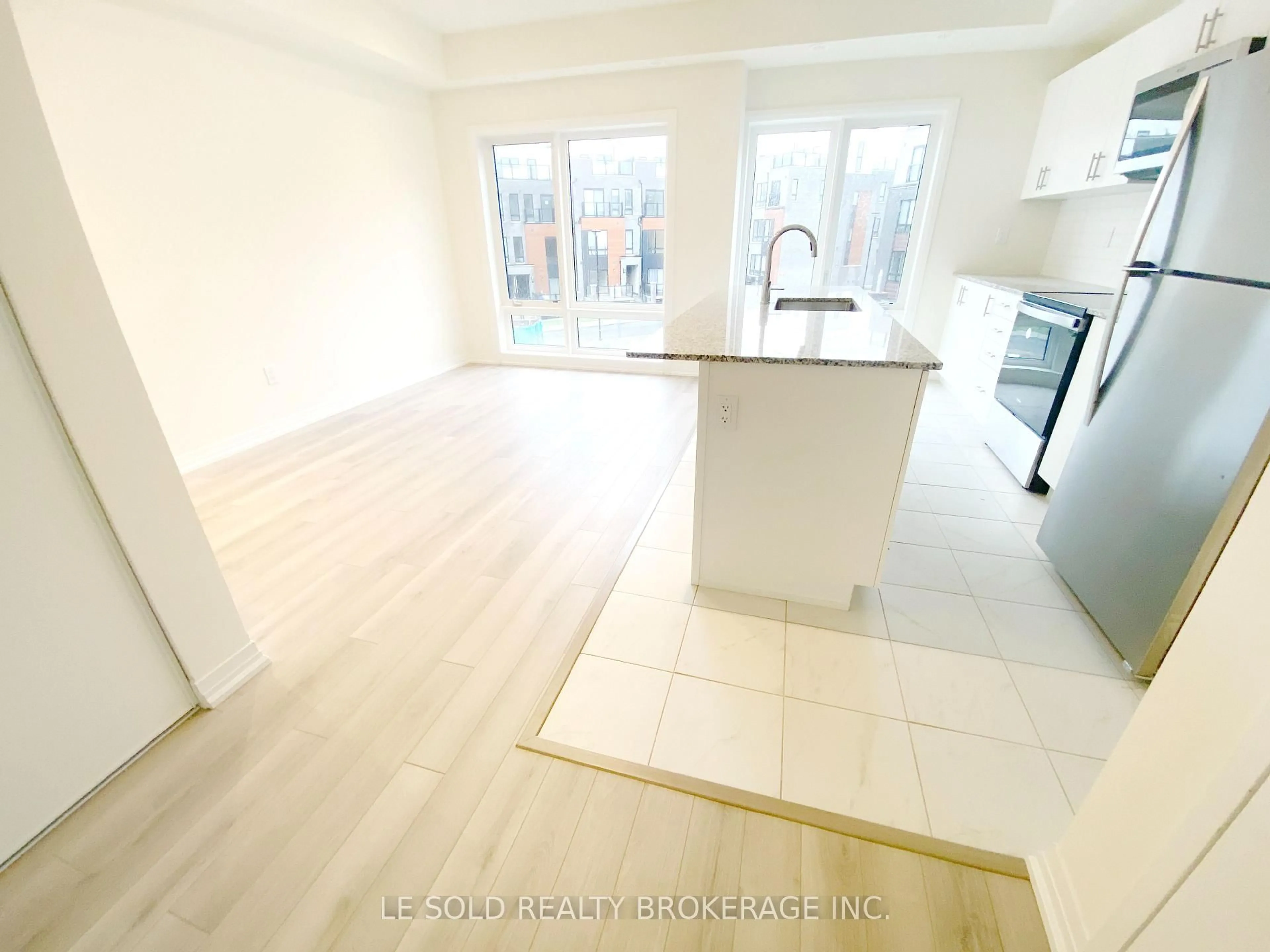 Open concept kitchen, unknown for 145 Tapscott Rd #32, Toronto Ontario M1B 0E8