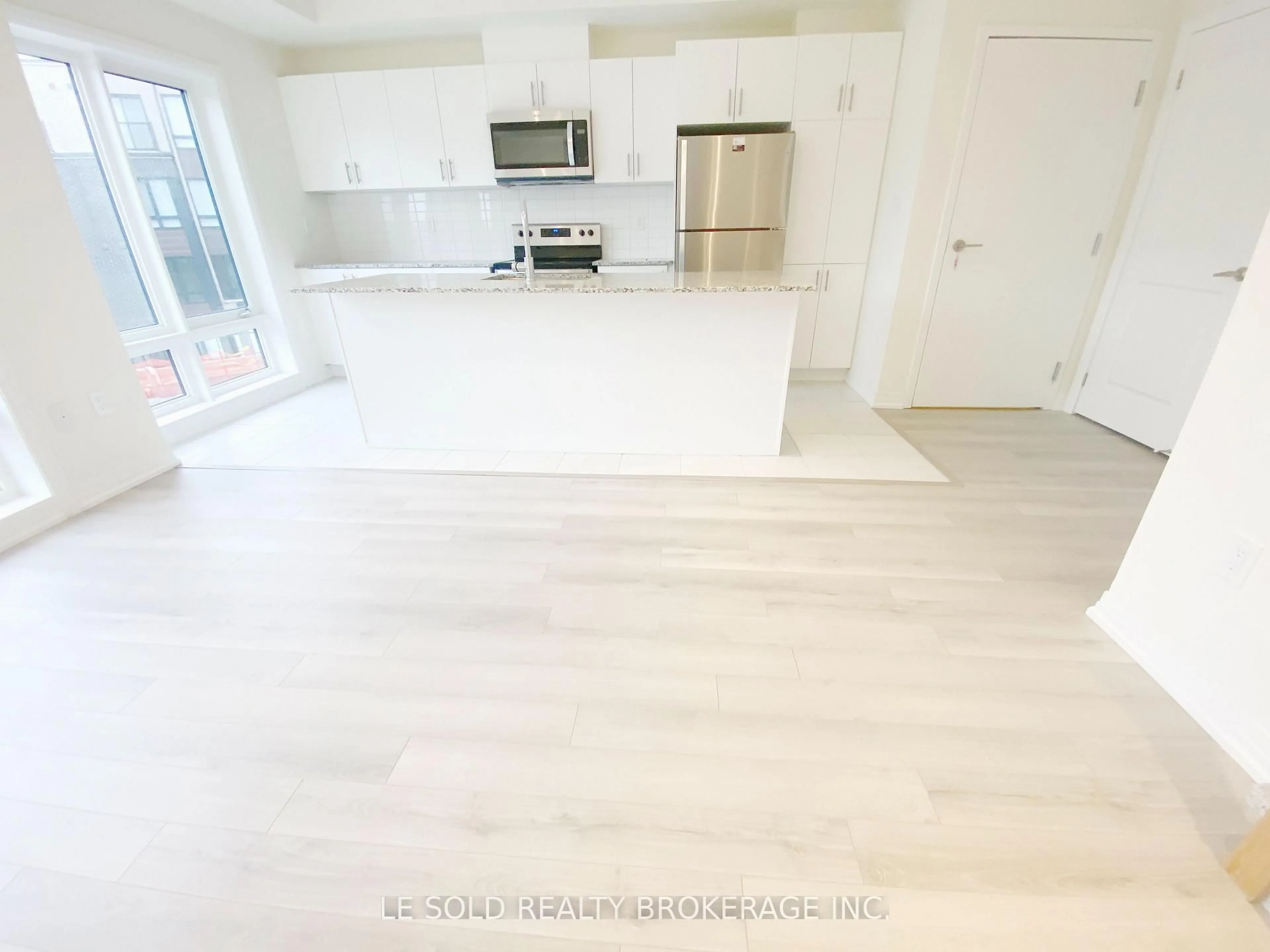Open concept kitchen, unknown for 145 Tapscott Rd #32, Toronto Ontario M1B 0E8