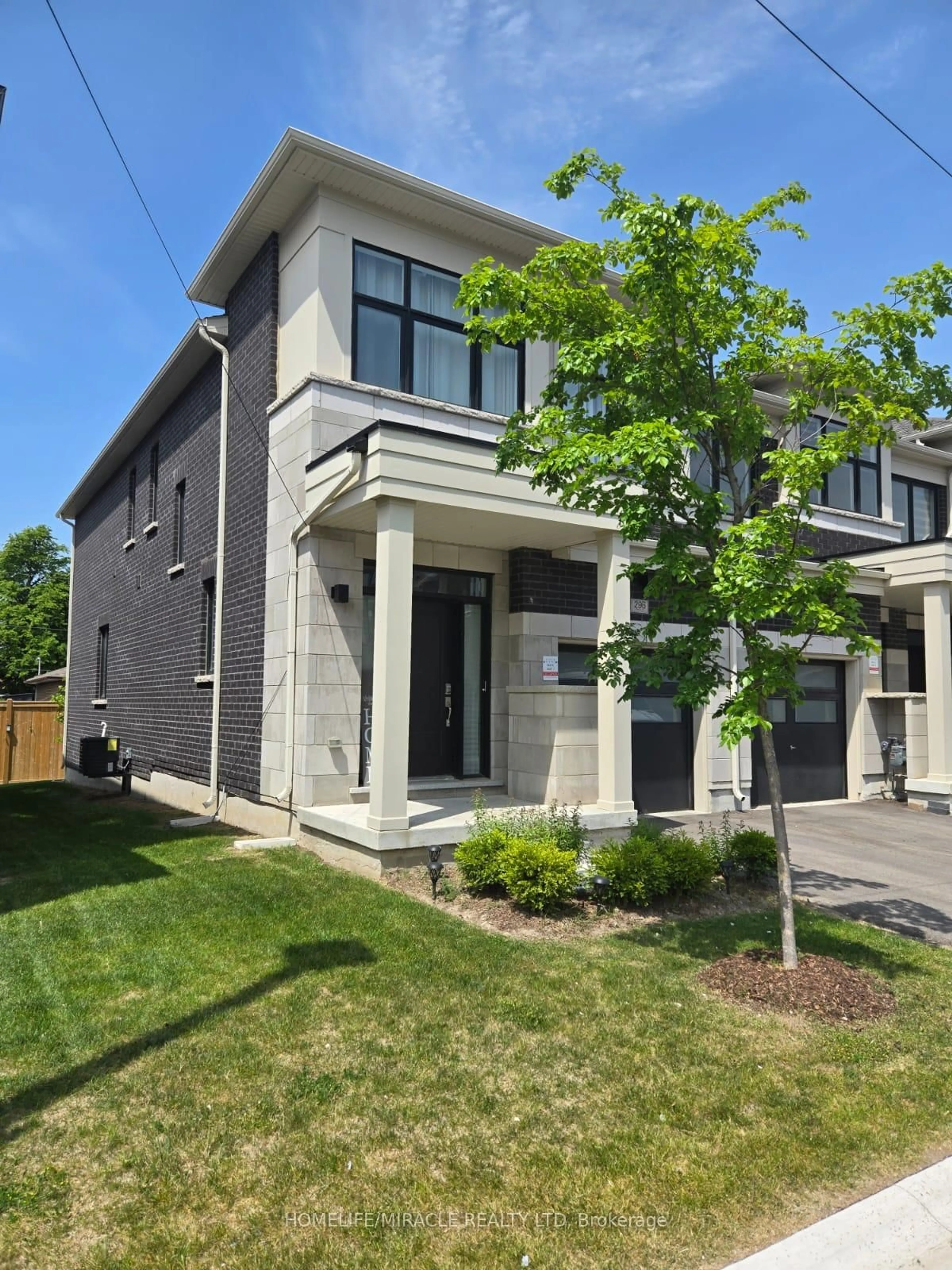 Home with brick exterior material, street for 296 Okanagan Path, Oshawa Ontario L1H 0A7