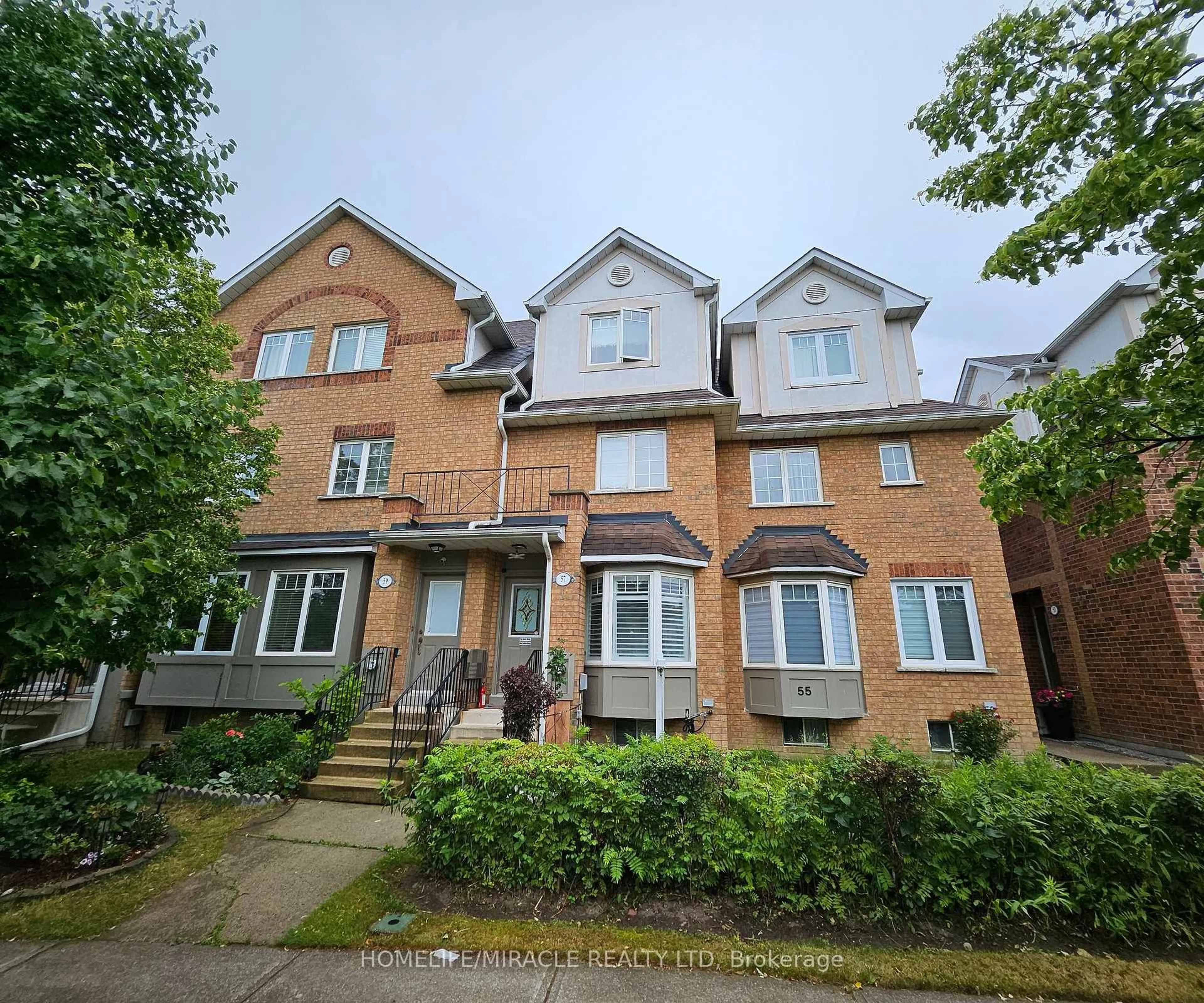 A pic from outside/outdoor area/front of a property/back of a property/a pic from drone, building for 57 Hedge End Rd #8, Toronto Ontario M1B 5Z4