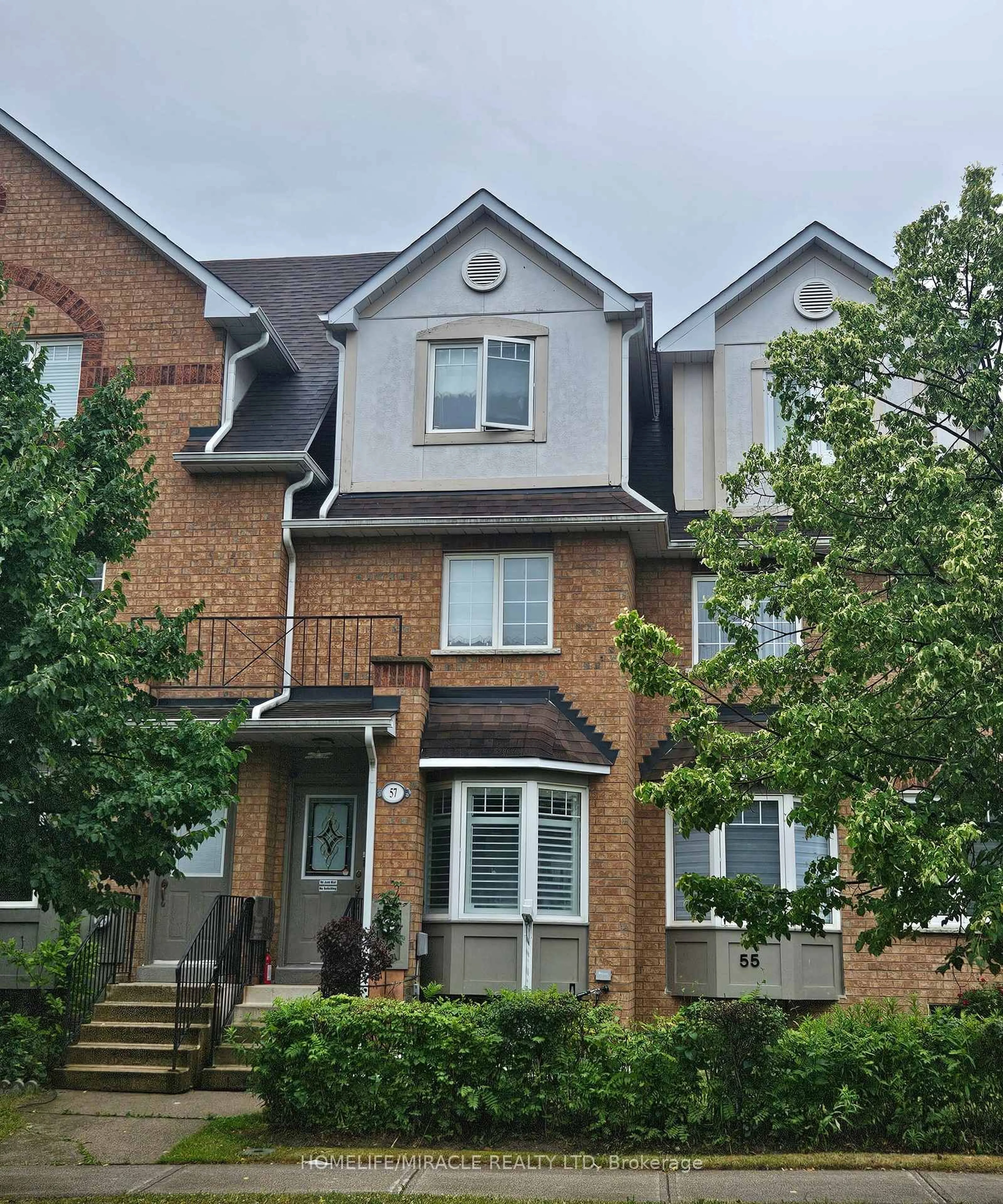 Home with brick exterior material, street for 57 Hedge End Rd #8, Toronto Ontario M1B 5Z4