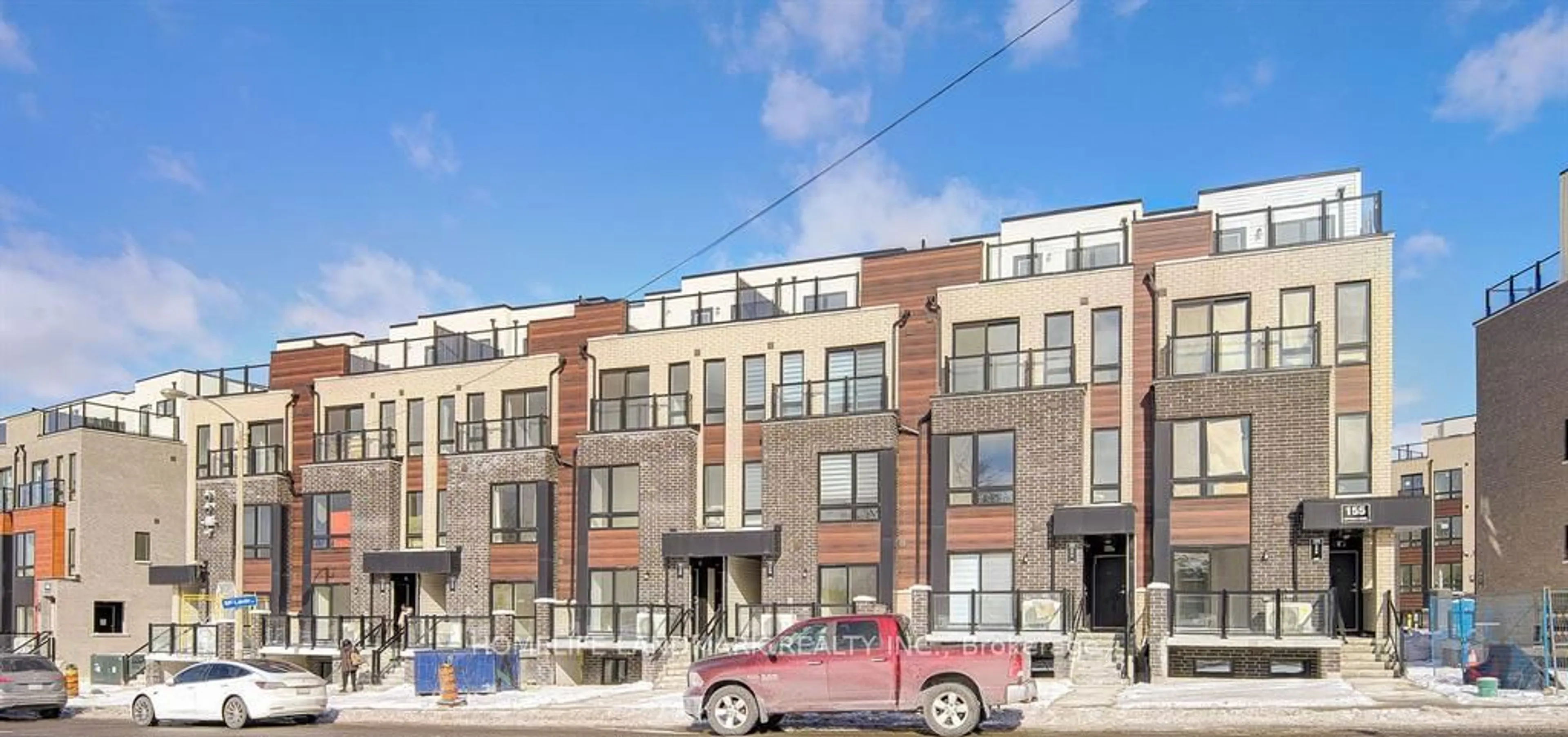Home with brick exterior material, street for 155 Tapscott Rd #5, Toronto Ontario M1B 0E8