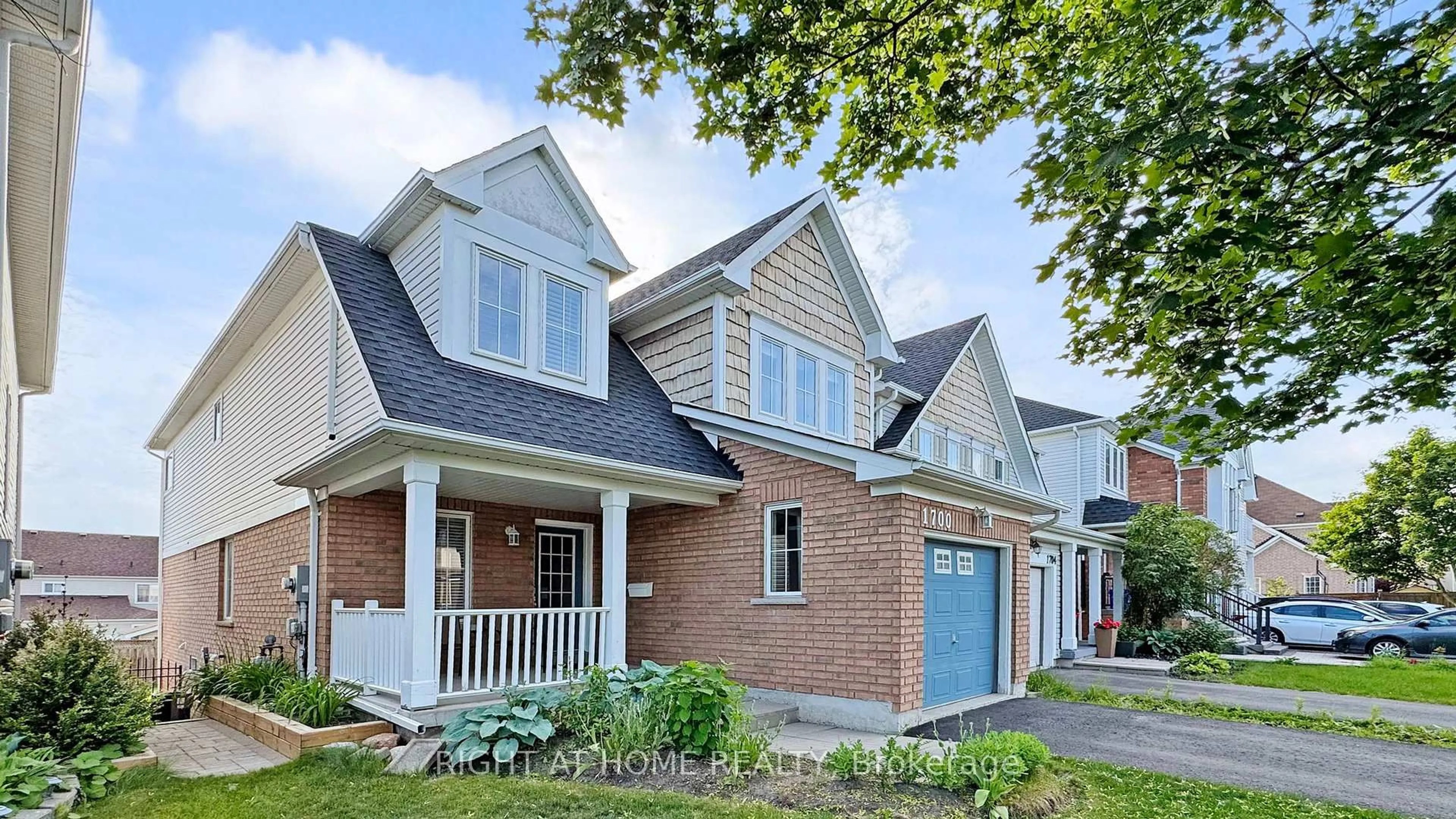 Home with brick exterior material, street for 1700 Spencely Dr, Oshawa Ontario L1K 0B2