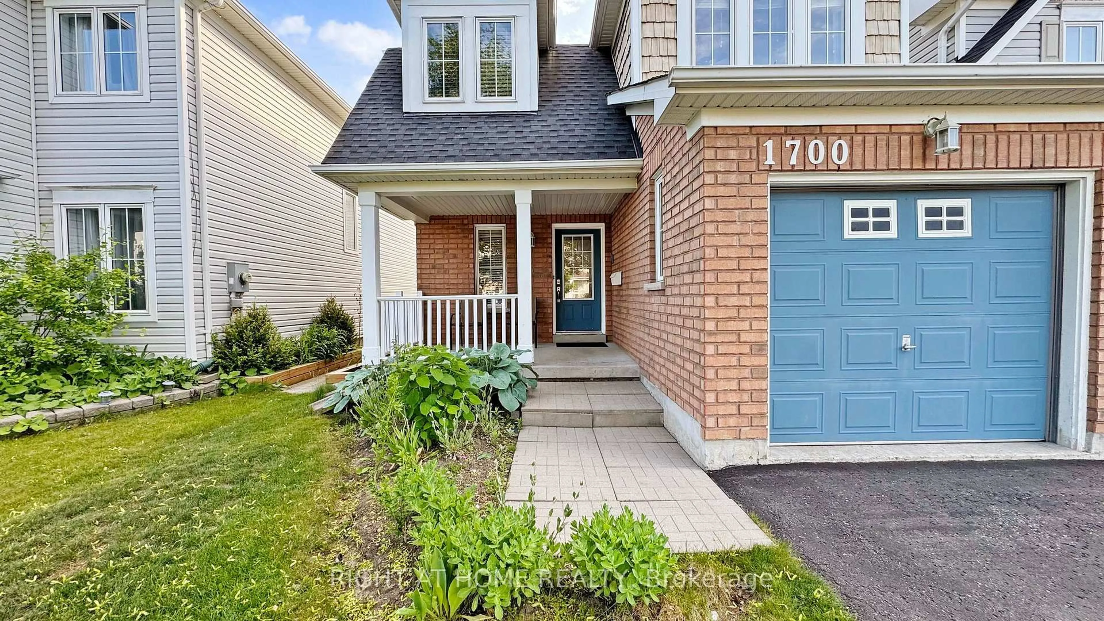 Home with brick exterior material, street for 1700 Spencely Dr, Oshawa Ontario L1K 0B2