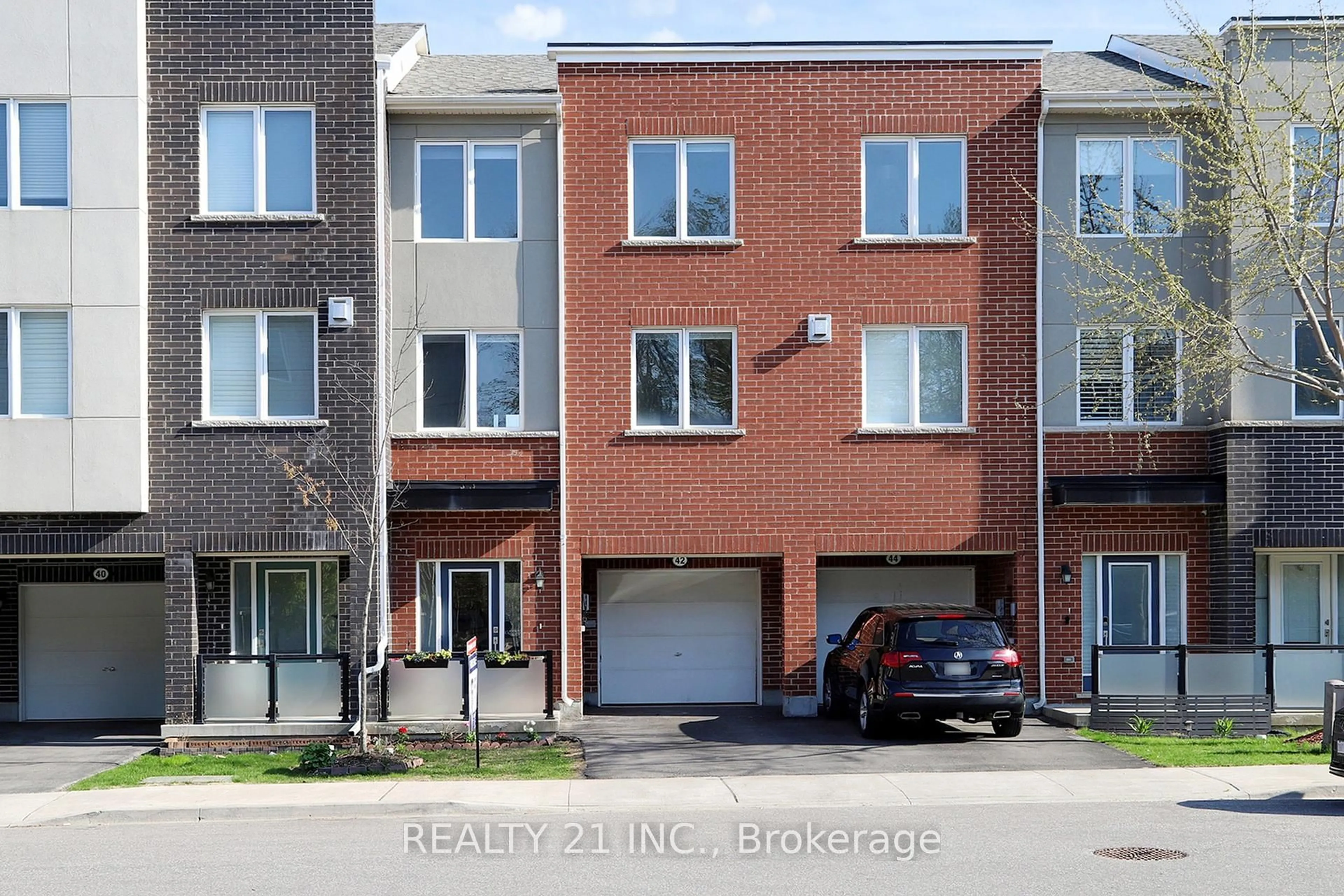 Home with brick exterior material, street for 42 Heron Park Pl Pl, Toronto Ontario M1E 0B8