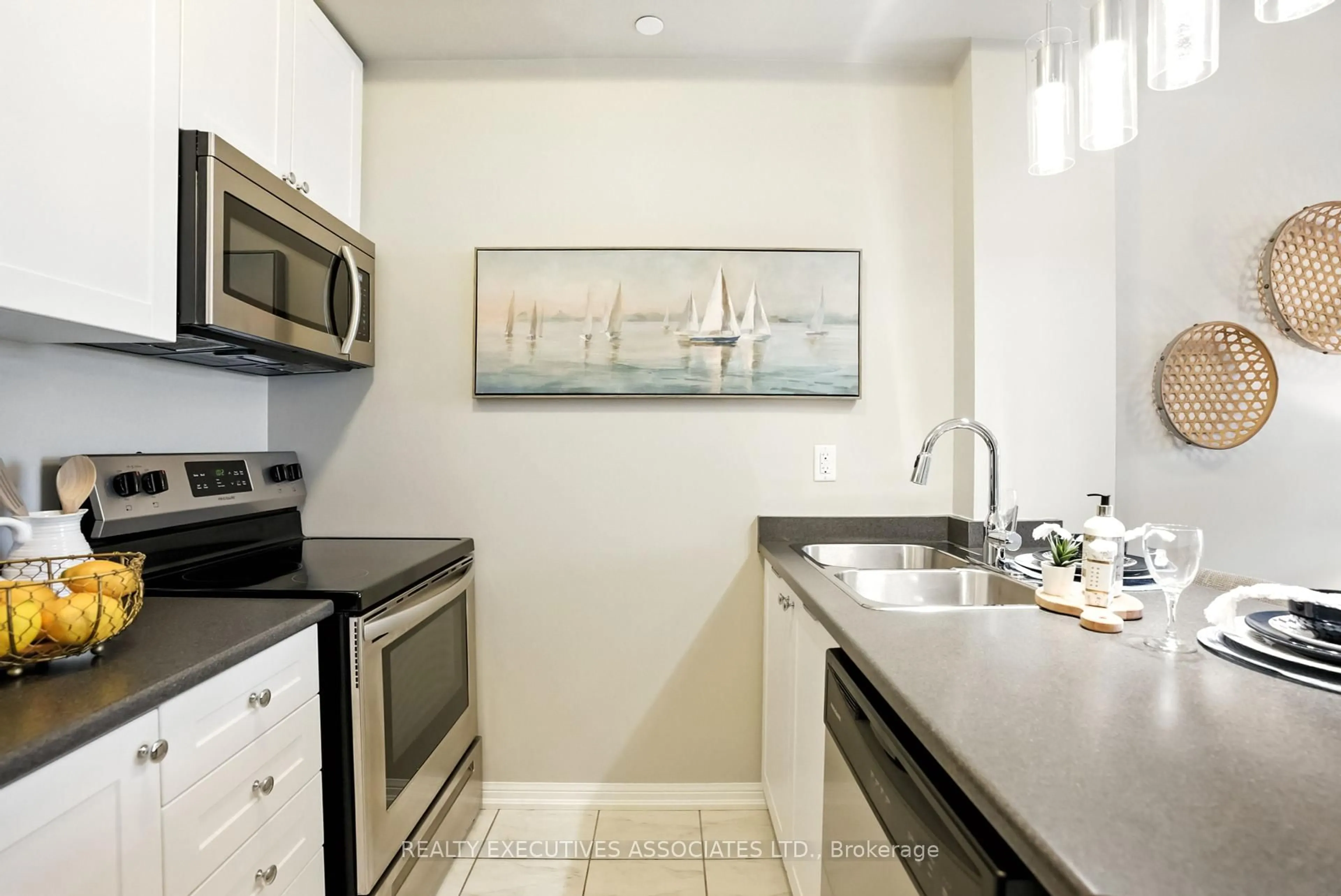 Standard kitchen, ceramic/tile floor for 84 Aspen Springs Dr #411, Clarington Ontario L1C 0V3