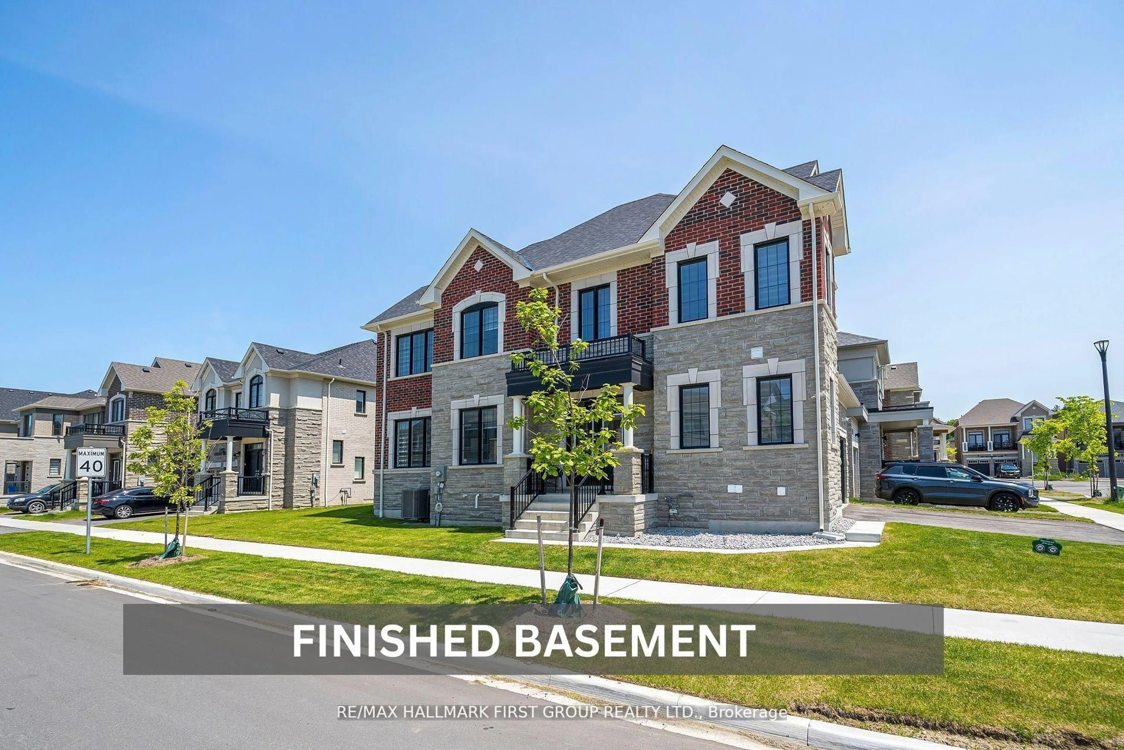 Home with vinyl exterior material, street for 1492 Hawktail Path, Pickering Ontario L1X 0N9