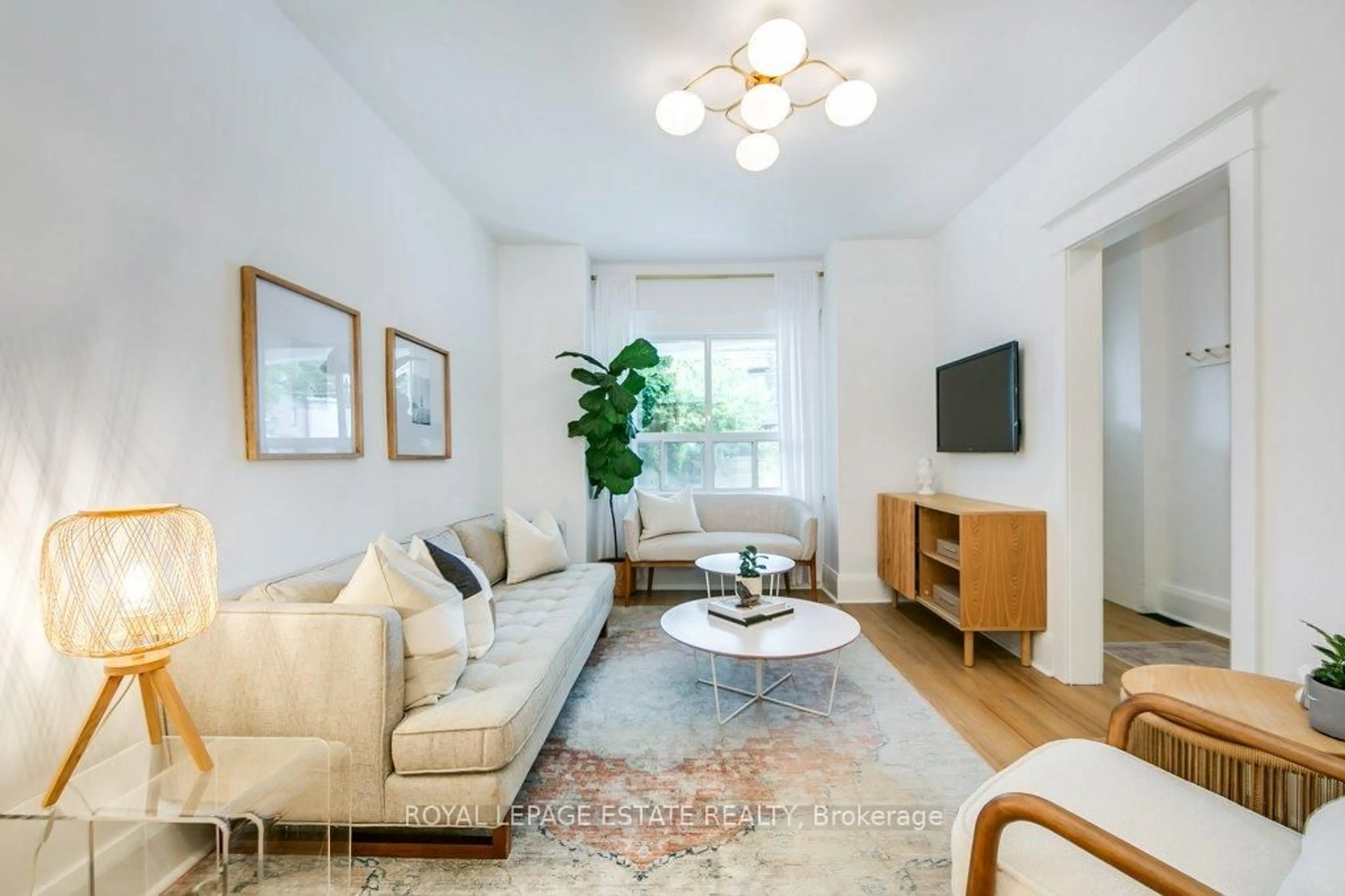 Living room with furniture, unknown for 130 Swanwick Ave, Toronto Ontario M4E 2A1