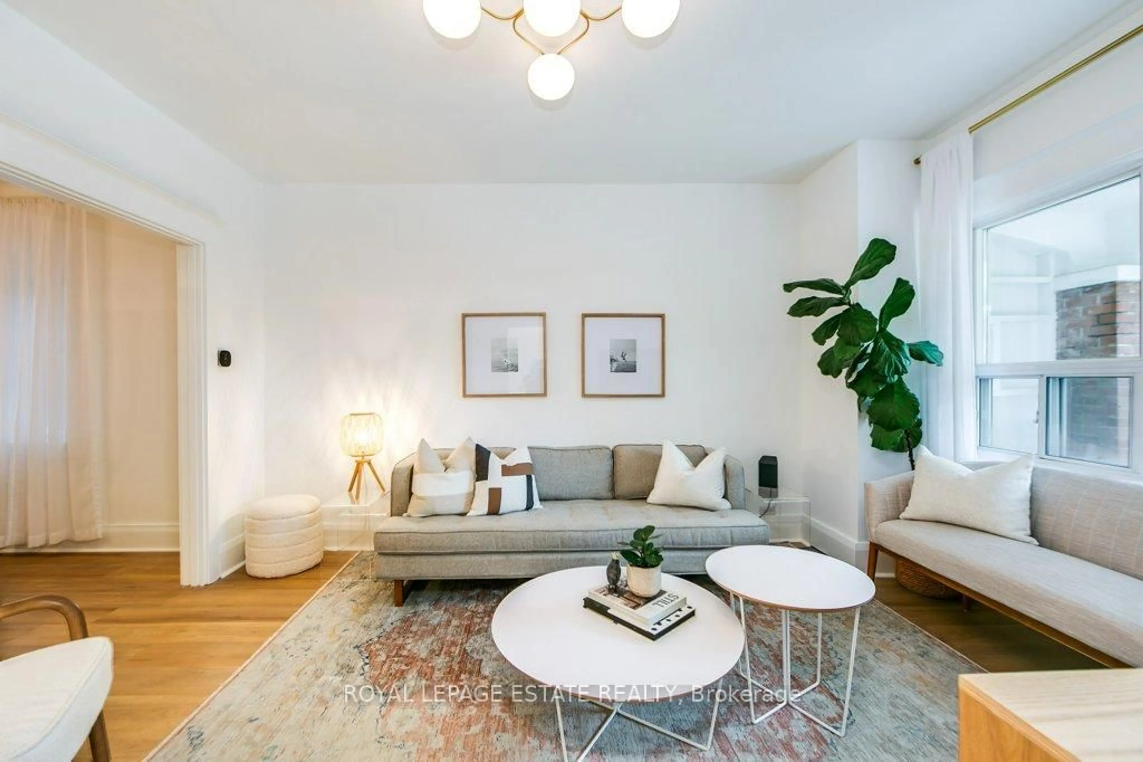 Living room with furniture, unknown for 130 Swanwick Ave, Toronto Ontario M4E 2A1