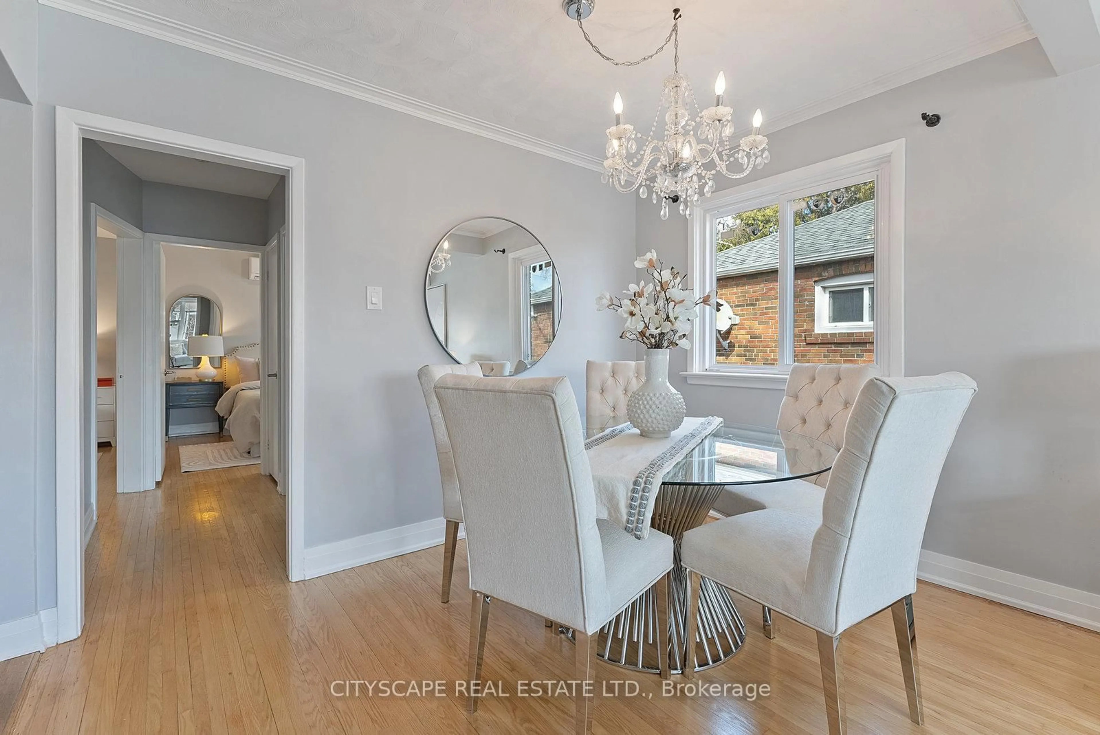 Dining room, wood/laminate floor for 65 Ivorwood Cres, Toronto Ontario M1R 2X6