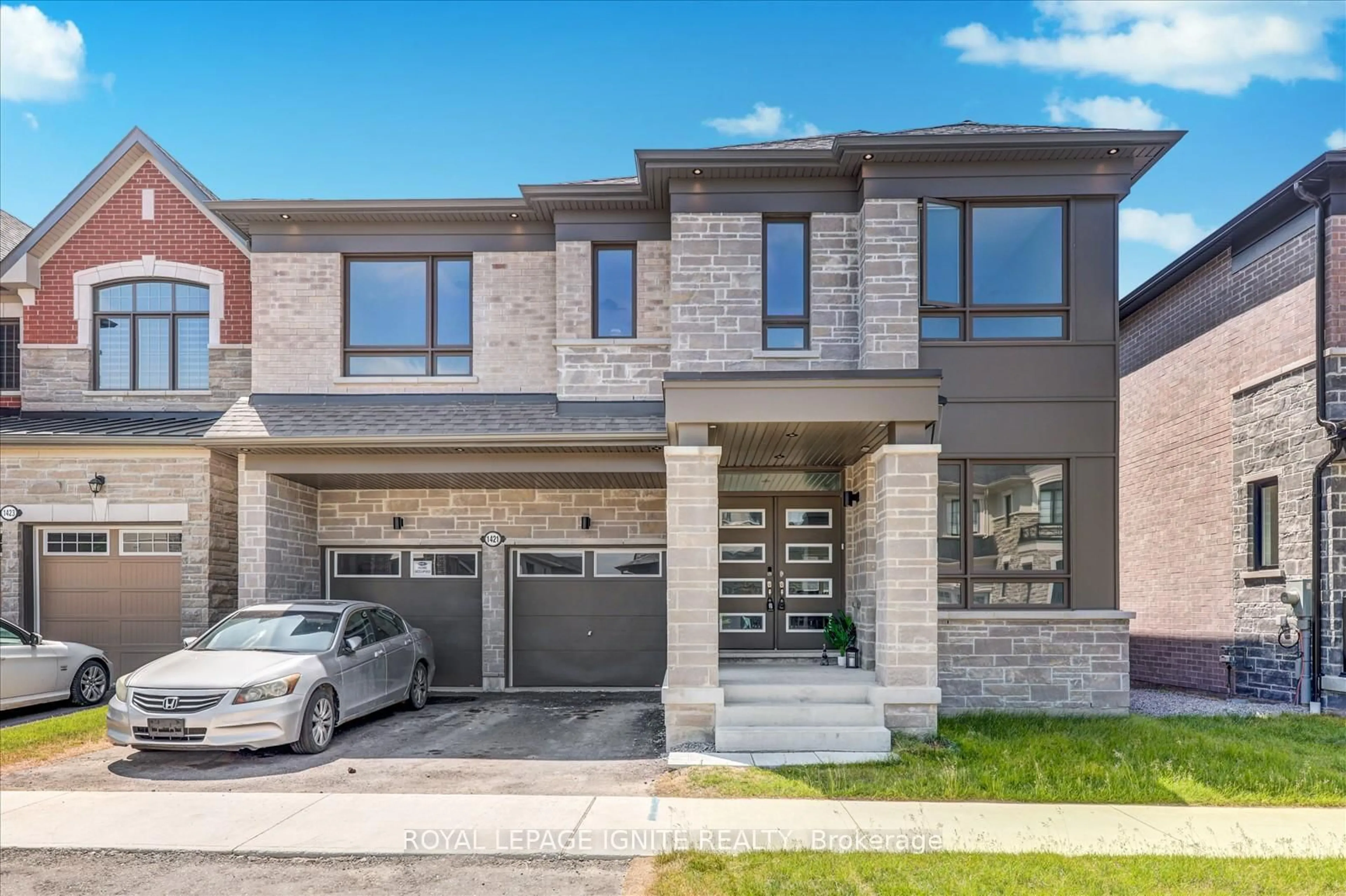 Home with brick exterior material, street for 1421 Swallowtail Lane, Pickering Ontario L1X 0N8