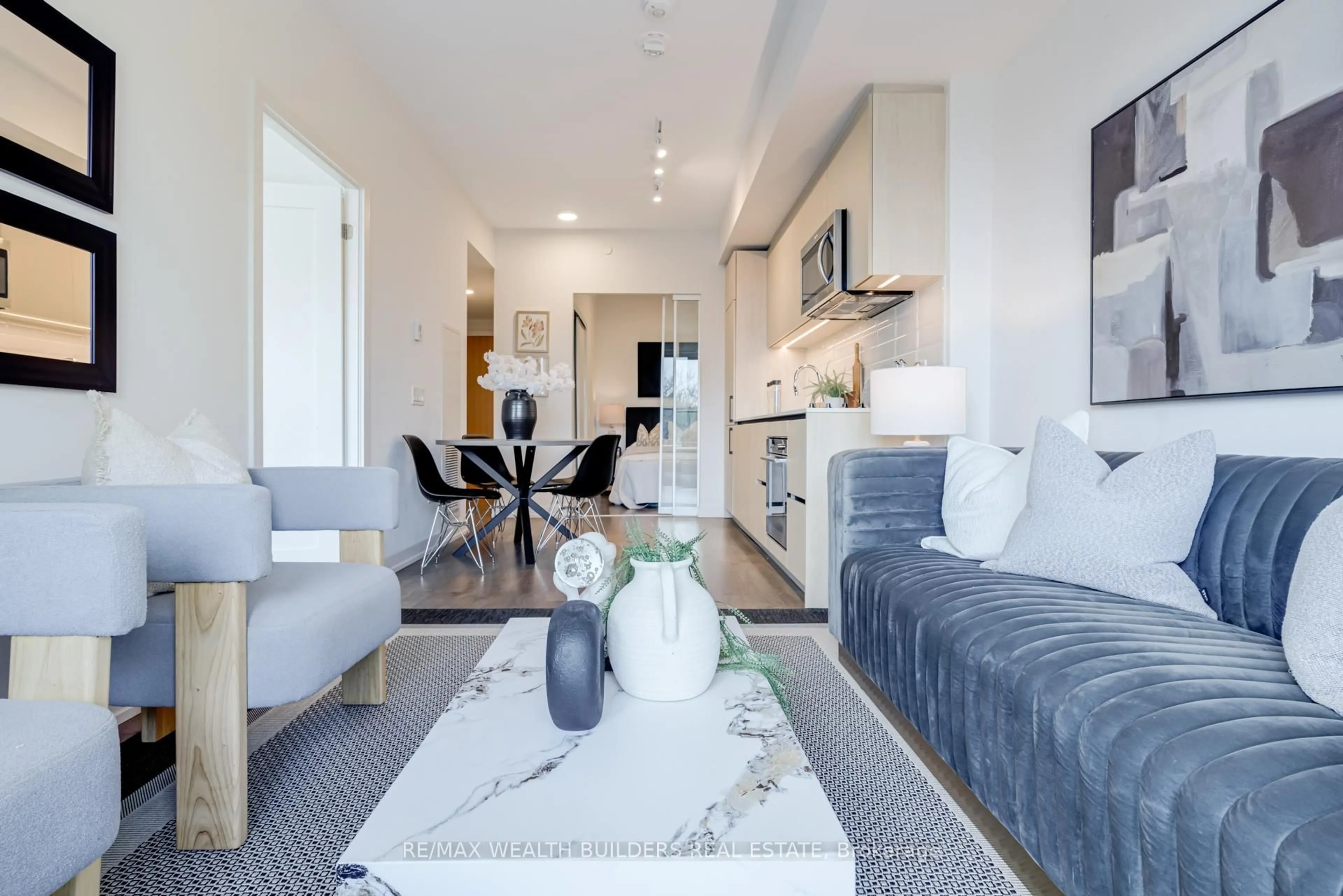 Living room with furniture, unknown for 150 Logan Ave #444, Toronto Ontario M4M 0E4