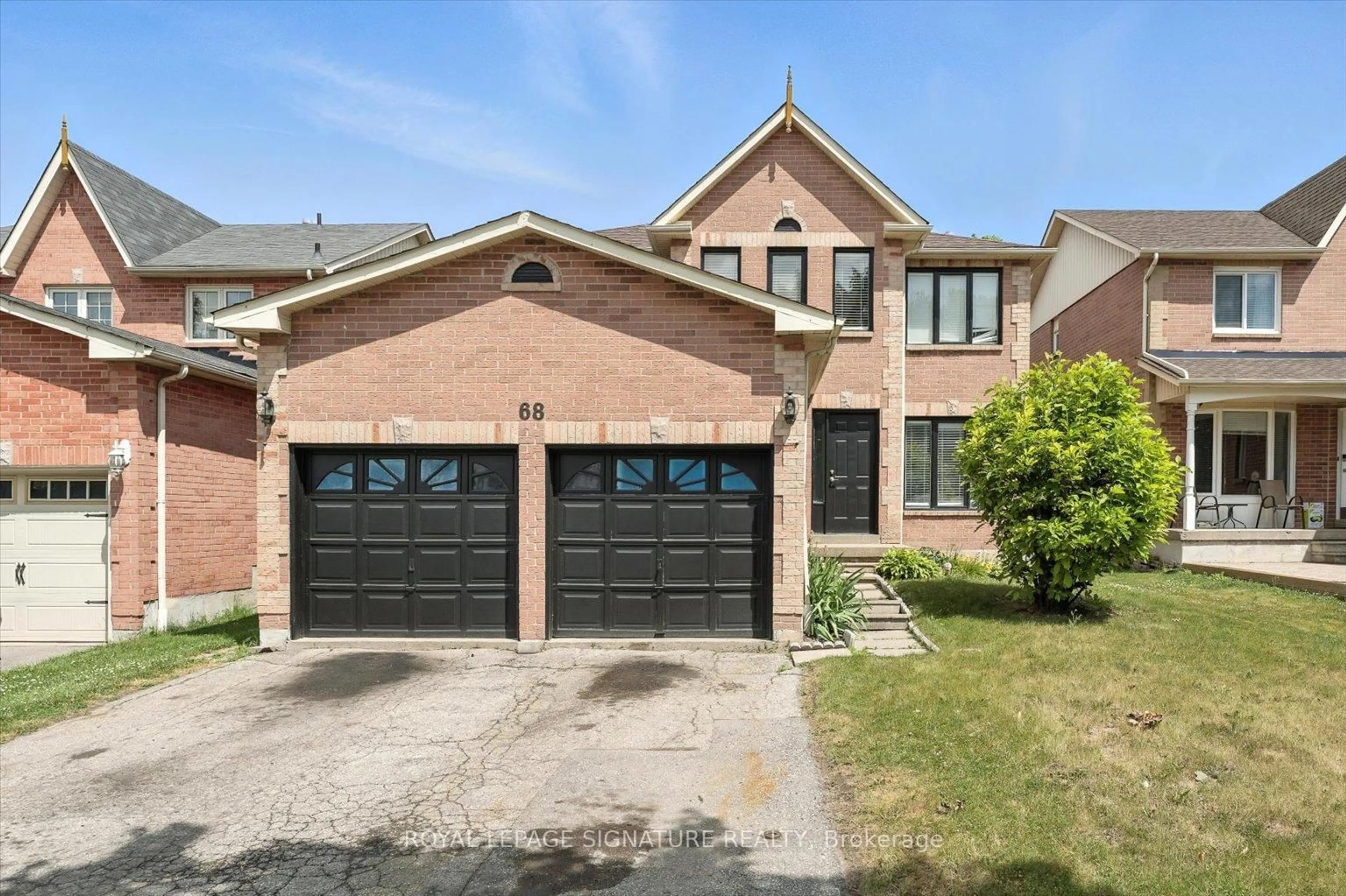 Home with brick exterior material, street for 68 Magill Dr, Ajax Ontario L1T 3K7