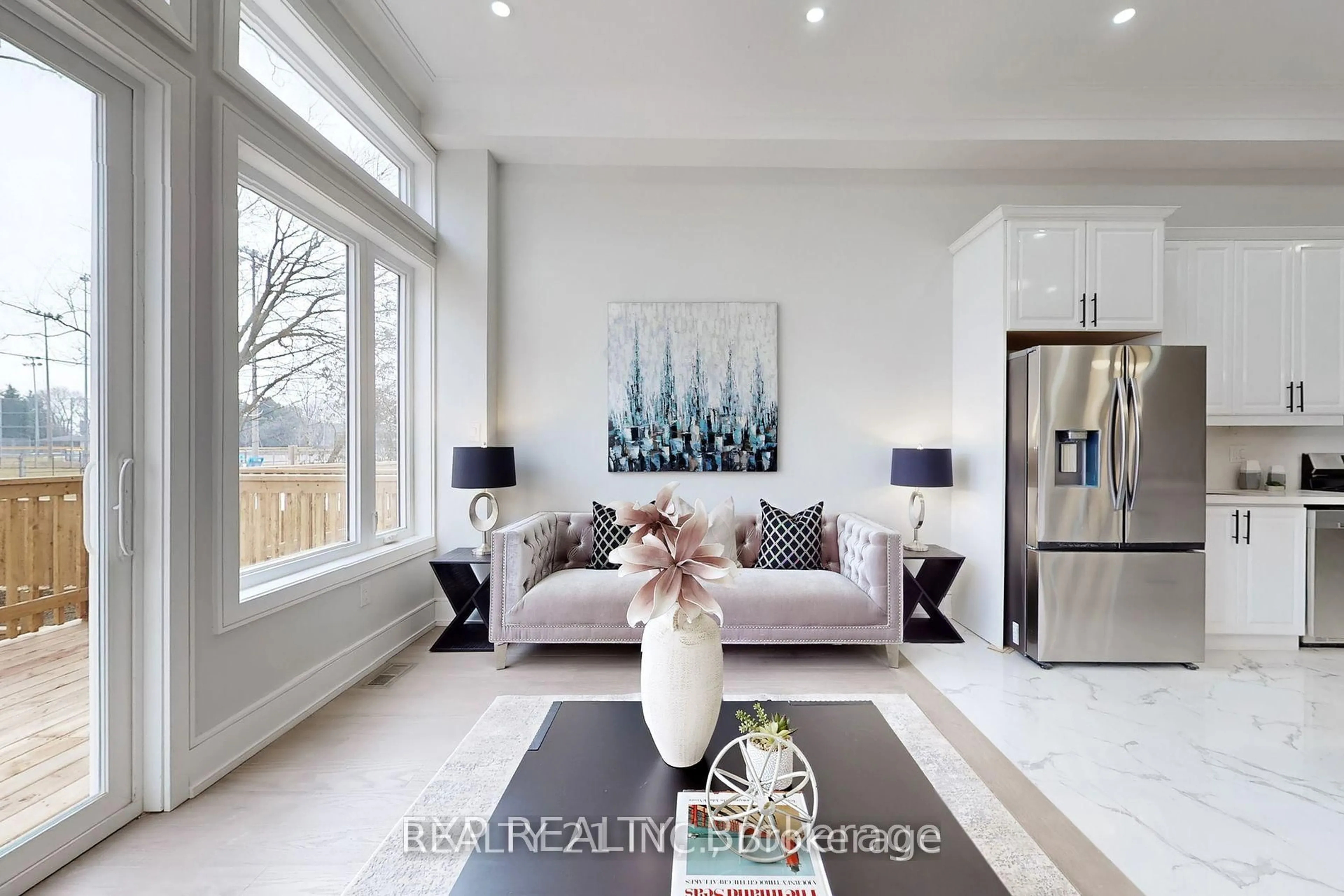 Living room with furniture, ceramic/tile floor for 17 Malta St, Toronto Ontario M1N 2L2