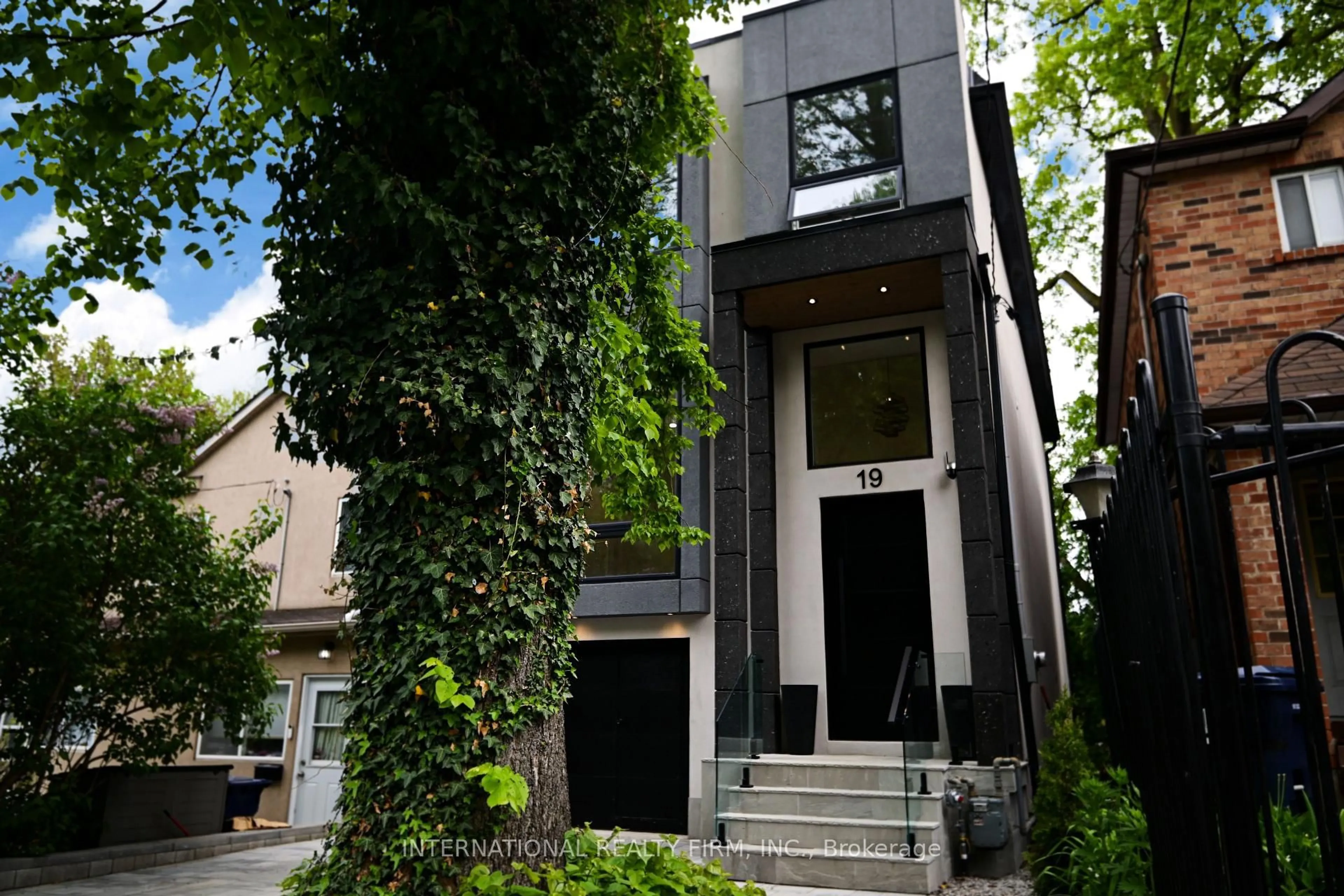 Home with brick exterior material, street for 19 Ivy Ave, Toronto Ontario M4L 2H6