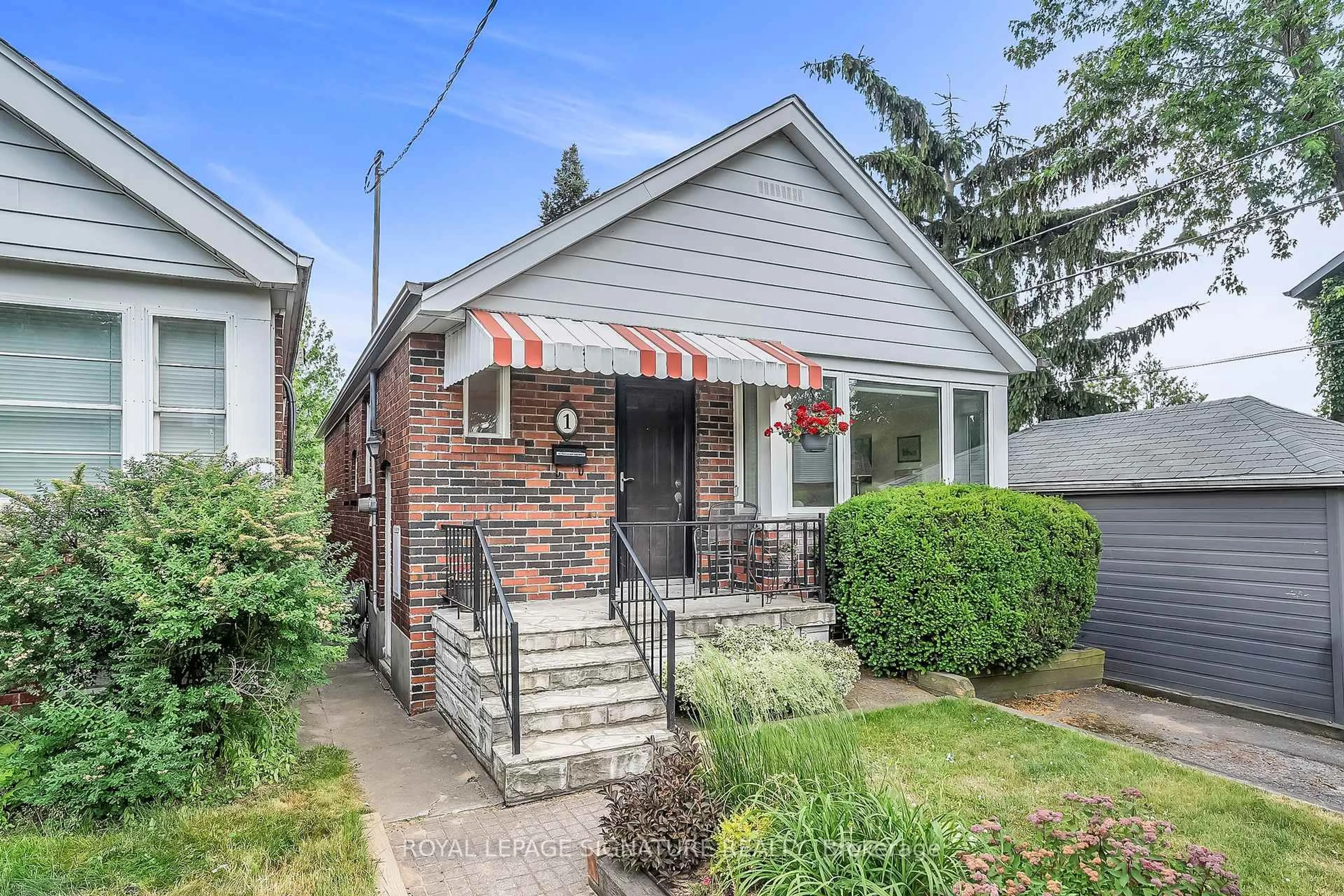 Home with brick exterior material, street for 1 Dieppe Rd, Toronto Ontario M4J 2K8
